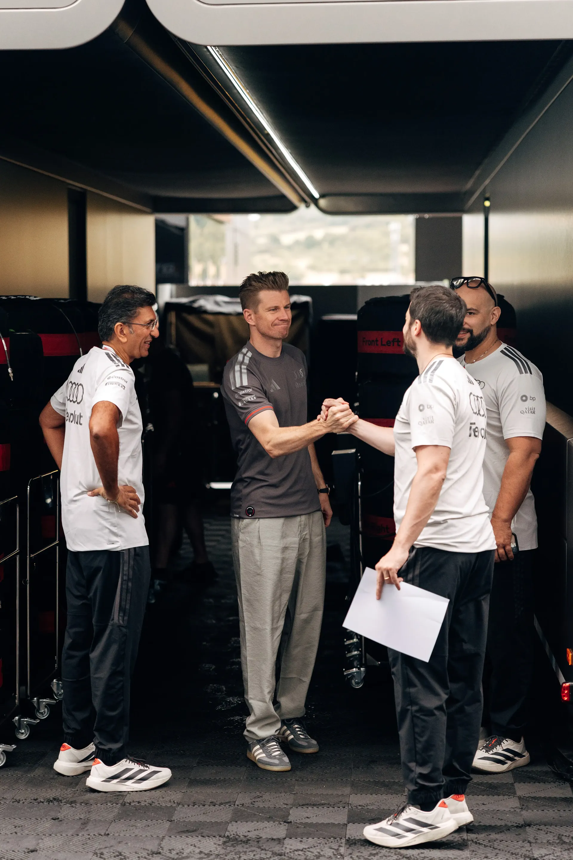 Audi Revolut F1® Team driver Nico Hulkenberg speaks with engineers in the Hungaroring garage.