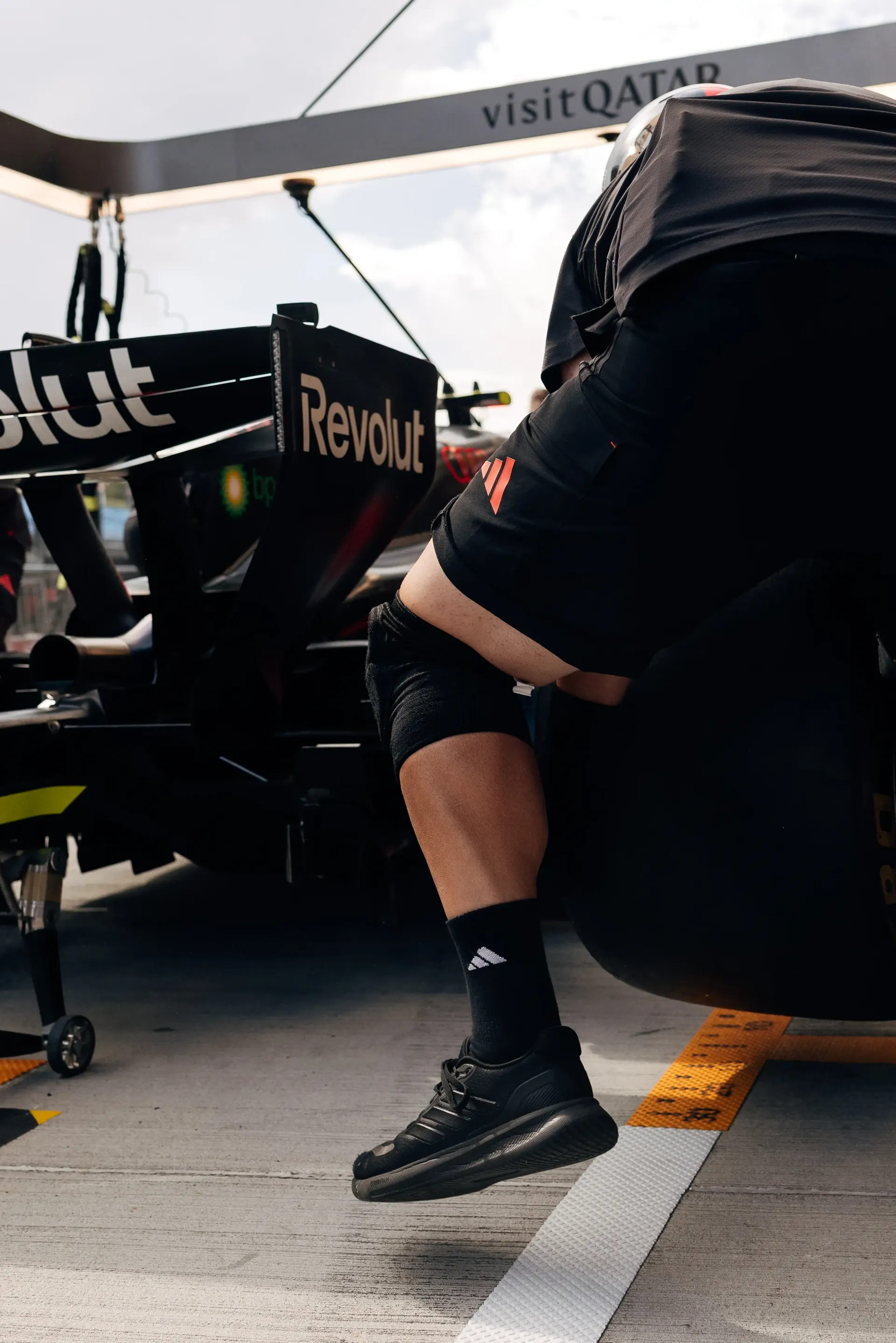 Audi Revolut F1® Team mechanics prepare the Audi R26 during driver installation ahead of FP1 at the Hungaroring.
