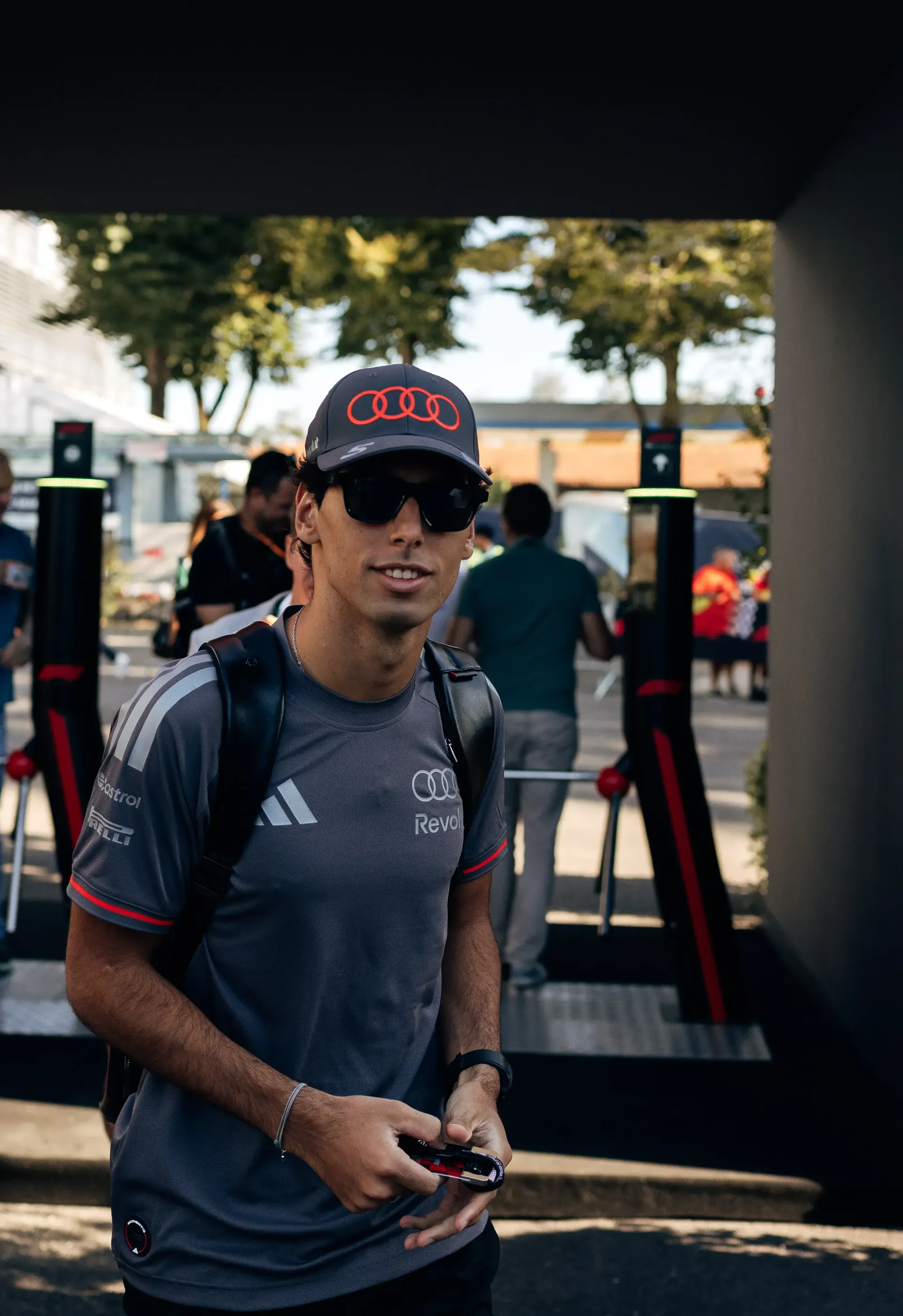 Audi Revolut F1® Team driver Gabriel Bortoleto arriving at the Monza paddock