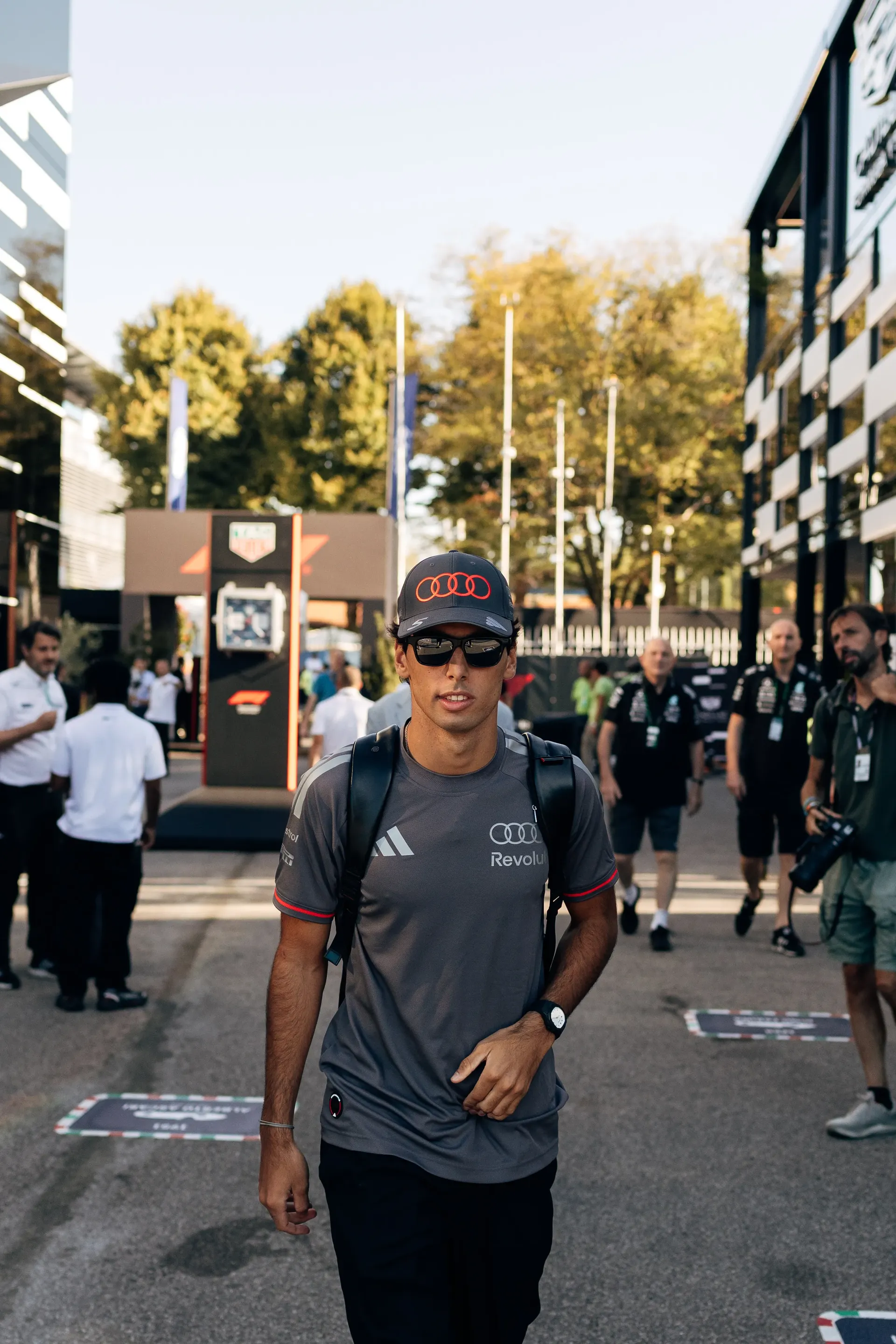 Audi Revolut F1® Team driver Gabriel Bortoleto walking through Monza