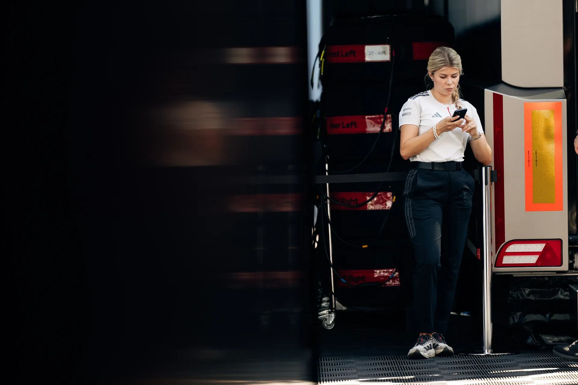 Audi Revolut F1® Team team engineer standing in the Monza paddock