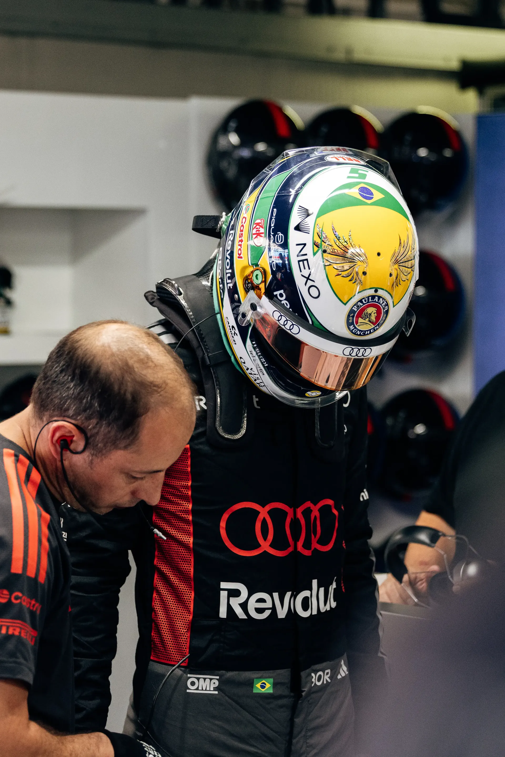 Audi Revolut F1® Team driver Gabriel Bortoleto in his helmet in the garage