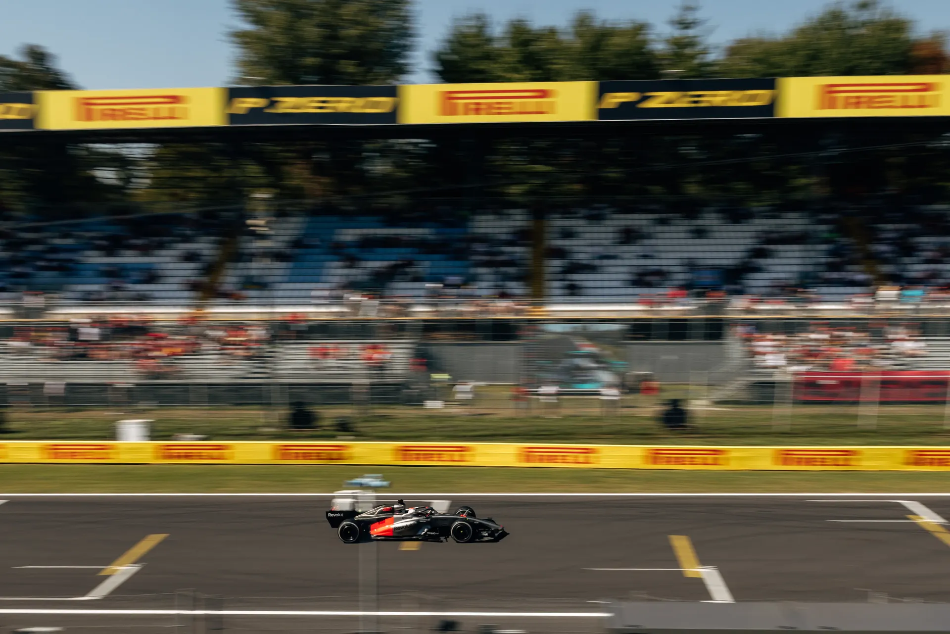 Audi R26 racing on track at Monza