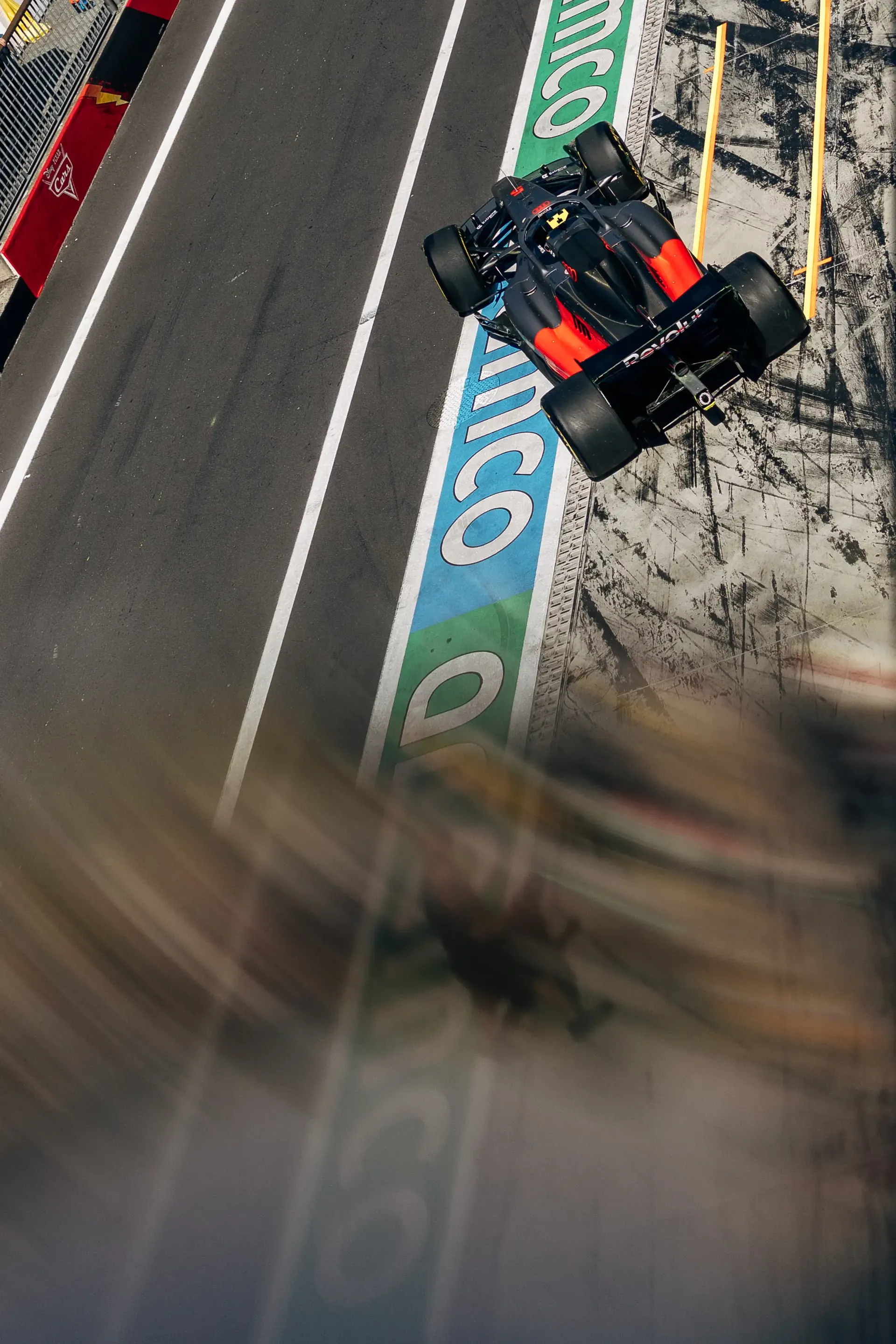 Audi R26 driving through a corner at Monza