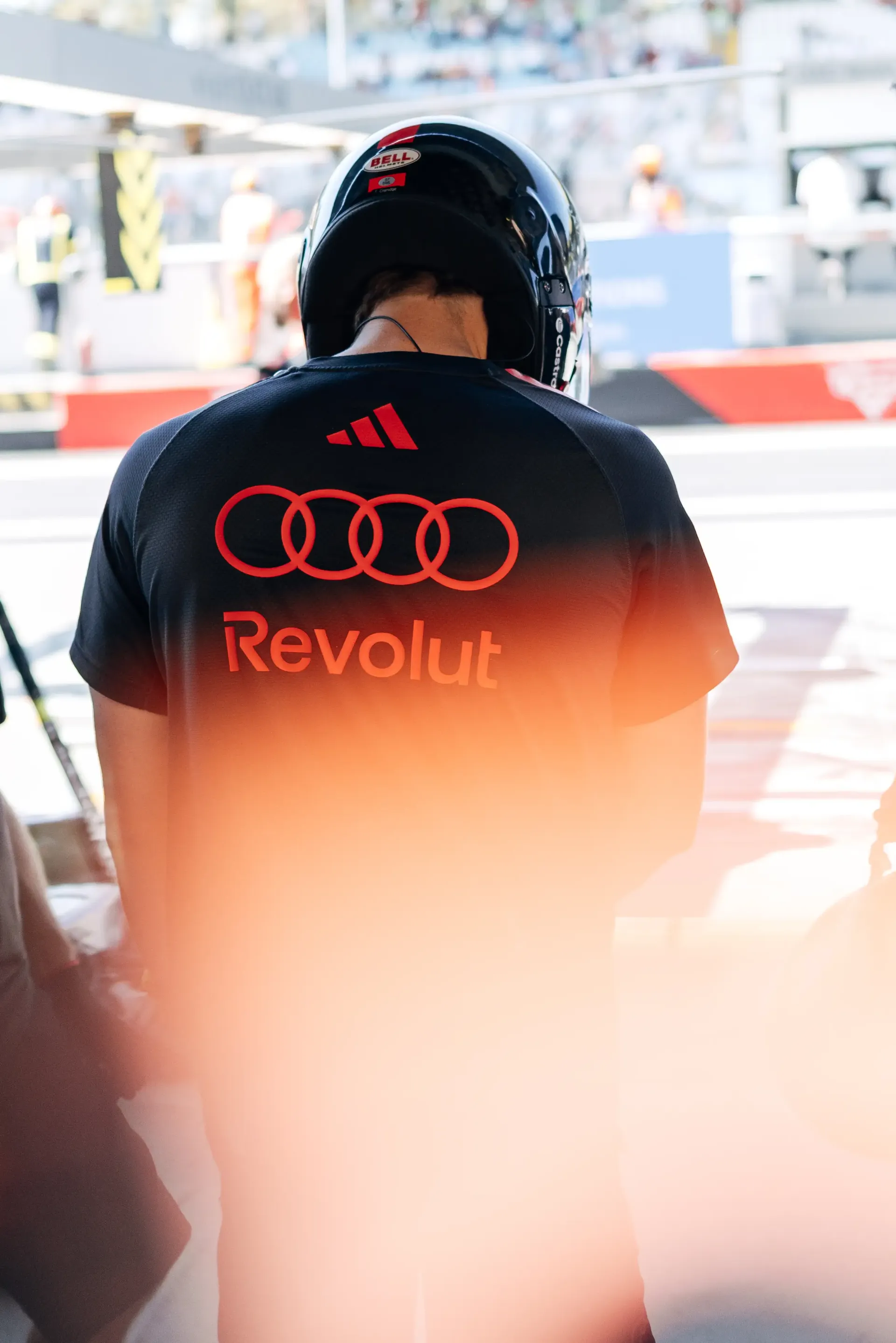 Audi Revolut F1® Team mechanic standing in the pit lane