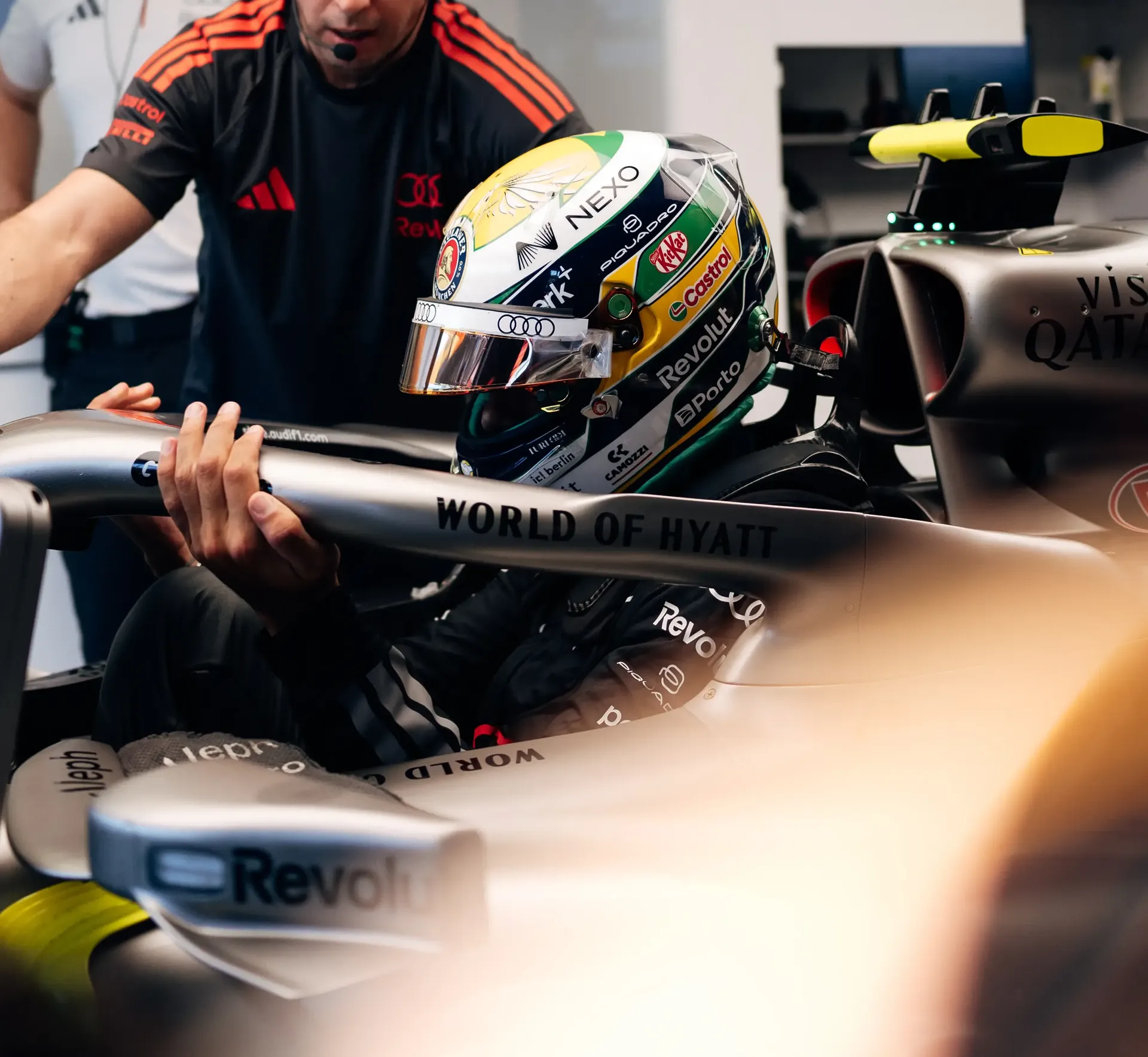 Audi Revolut F1® Team driver and mechanic working together in the garage
