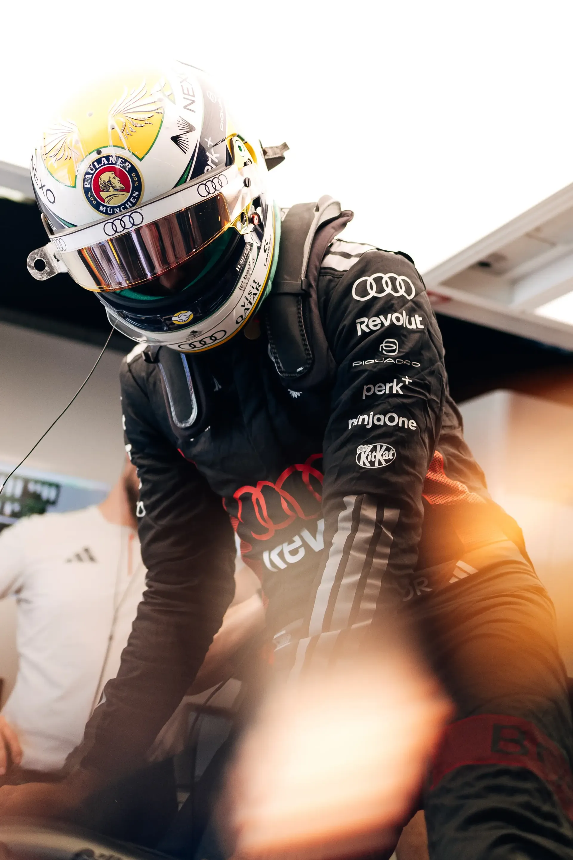 Audi Revolut F1® Team driver Gabriel Bortoleto in race gear inside the garage