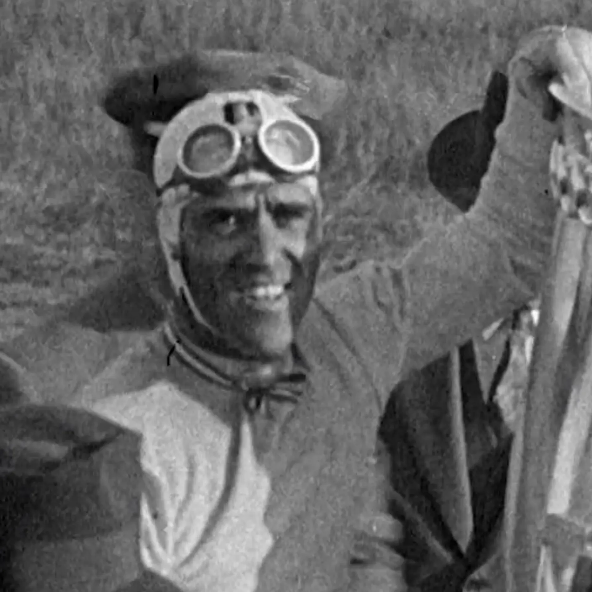 Portrait of legendary Italian racing driver Tazio Nuvolari wearing racing goggles