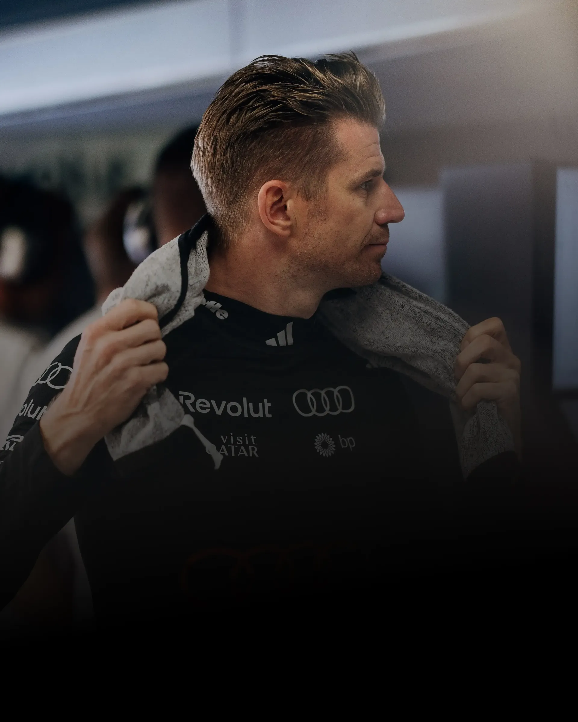 Nico Hulkenberg driver at Audi Revolut F1® Team standing in the paddock.