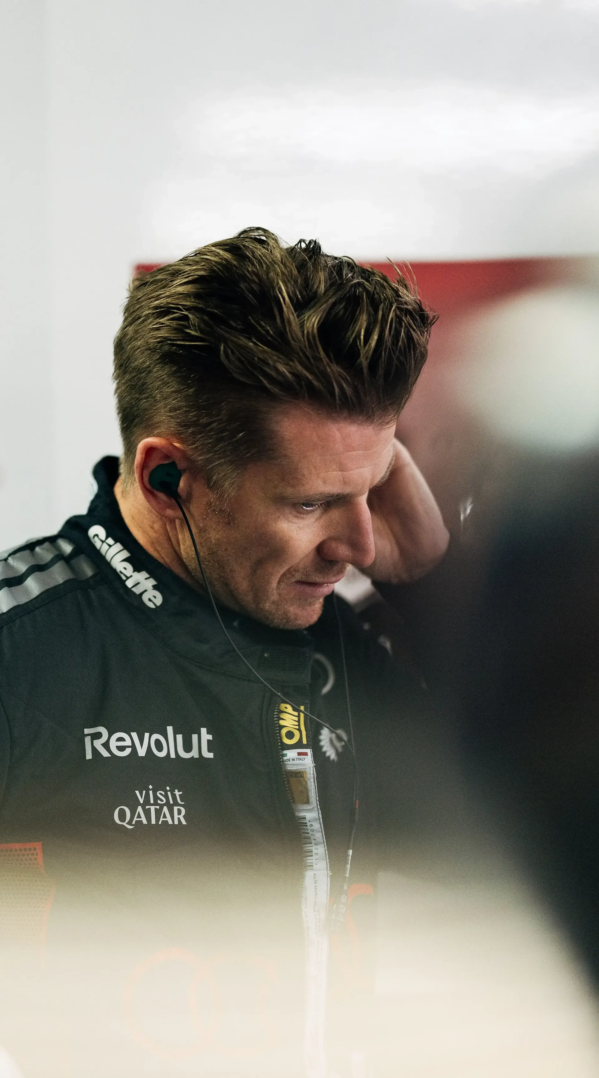 Nico Hulkenberg driver at Audi Revolut F1® Team standing in the paddock.