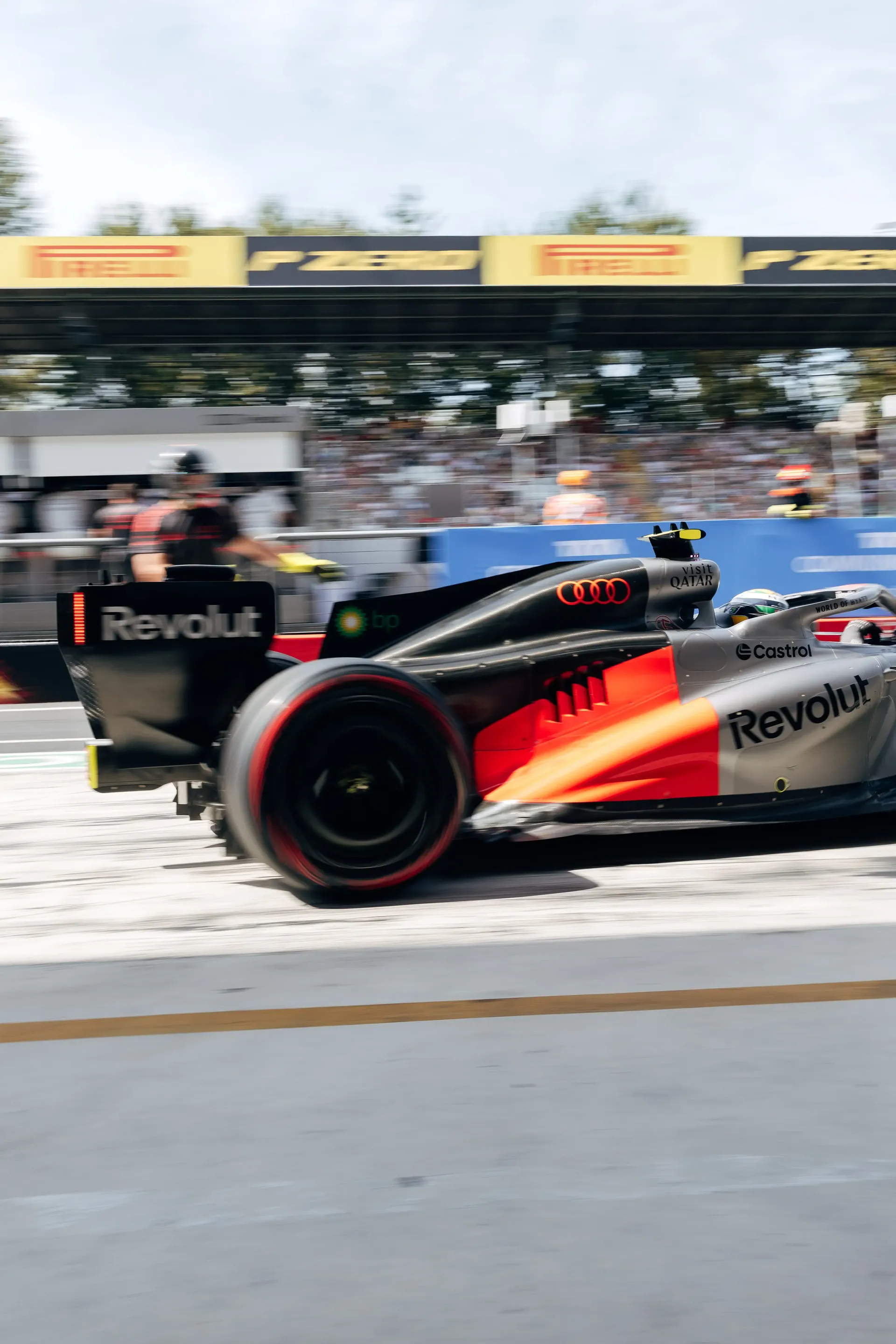 Audi Revolut F1® Team car the Audi R26 driving through the pit lane.
