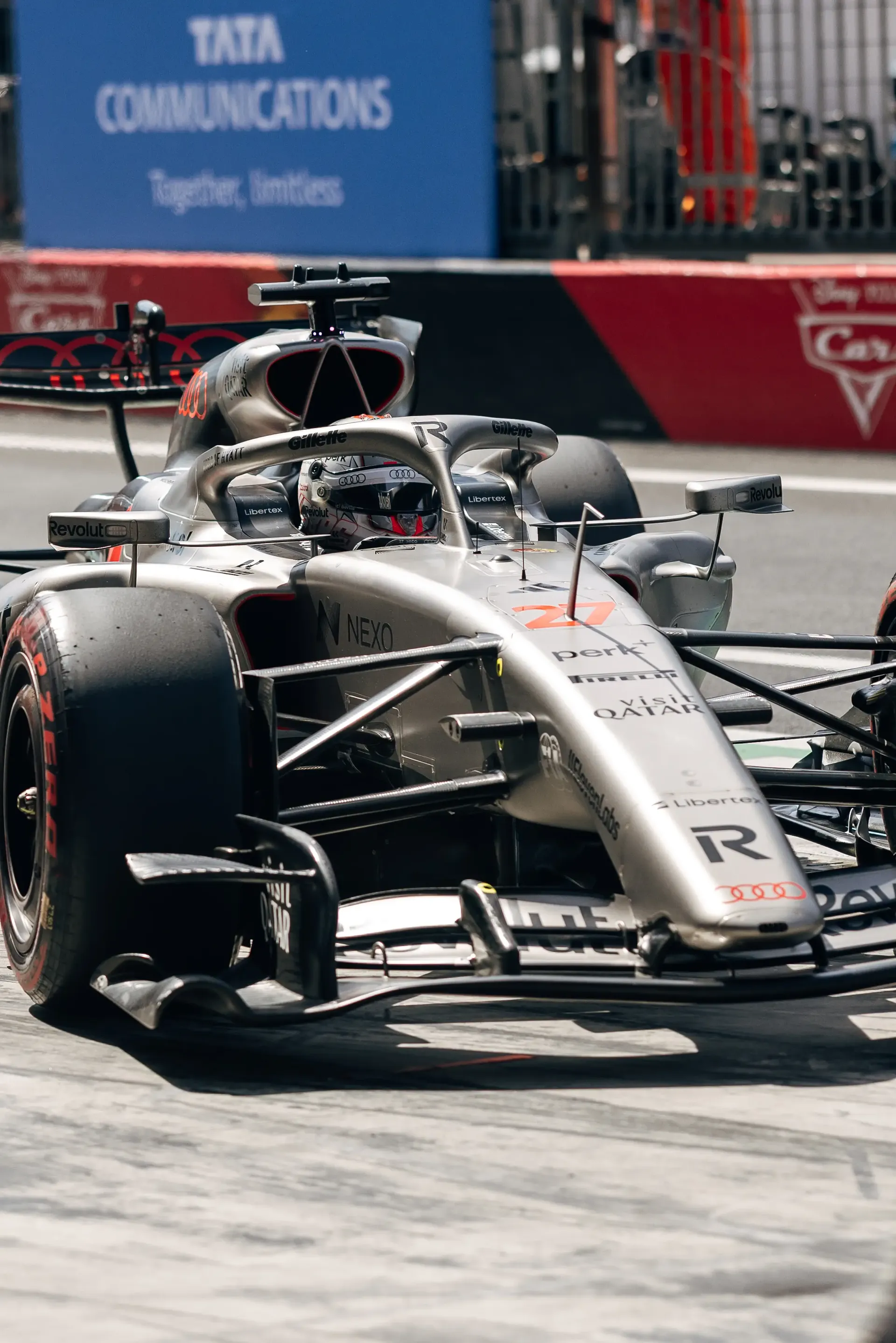 Audi Revolut F1® Team car the Audi R26 driving through the pit lane.