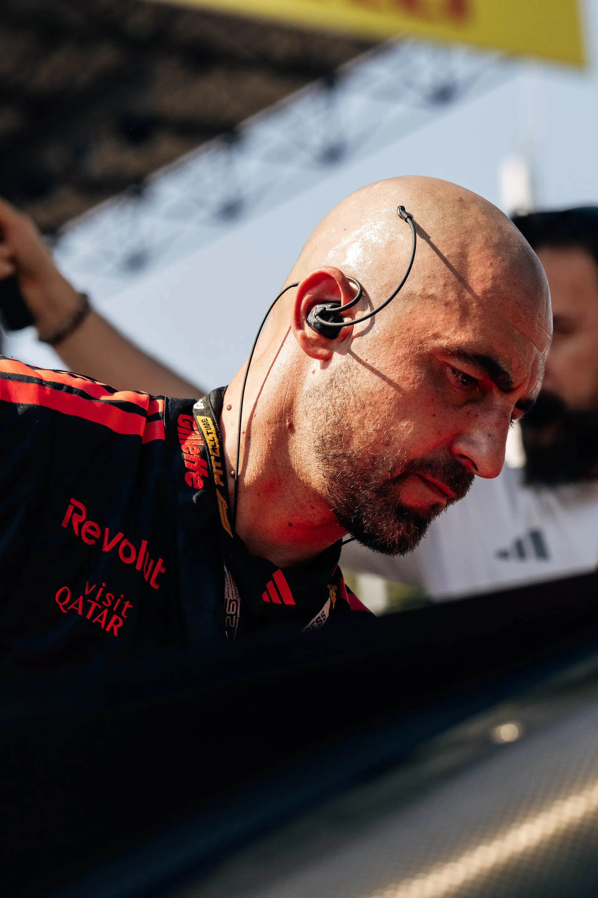 Audi Revolut F1® Team mechanic working on equipment in the garage