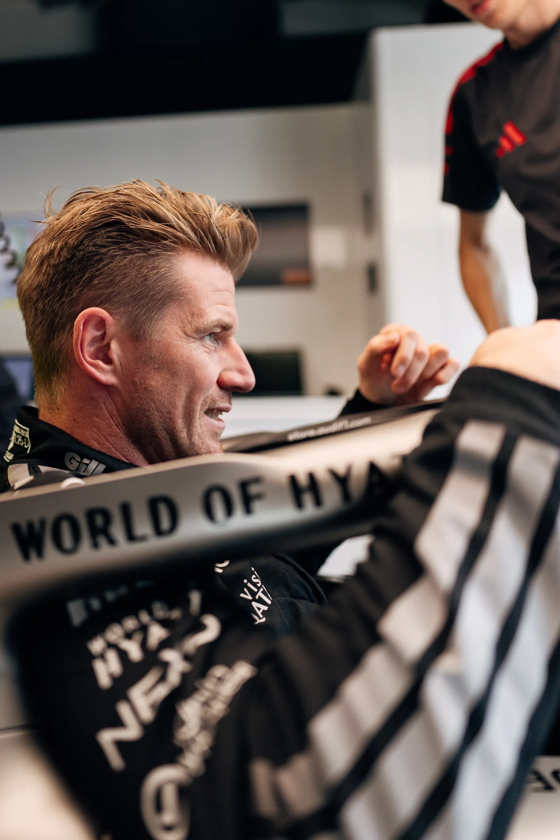 Nico Hulkenberg seated inside the Audi Revolut F1® Team garage during the Italian Grand Prix.