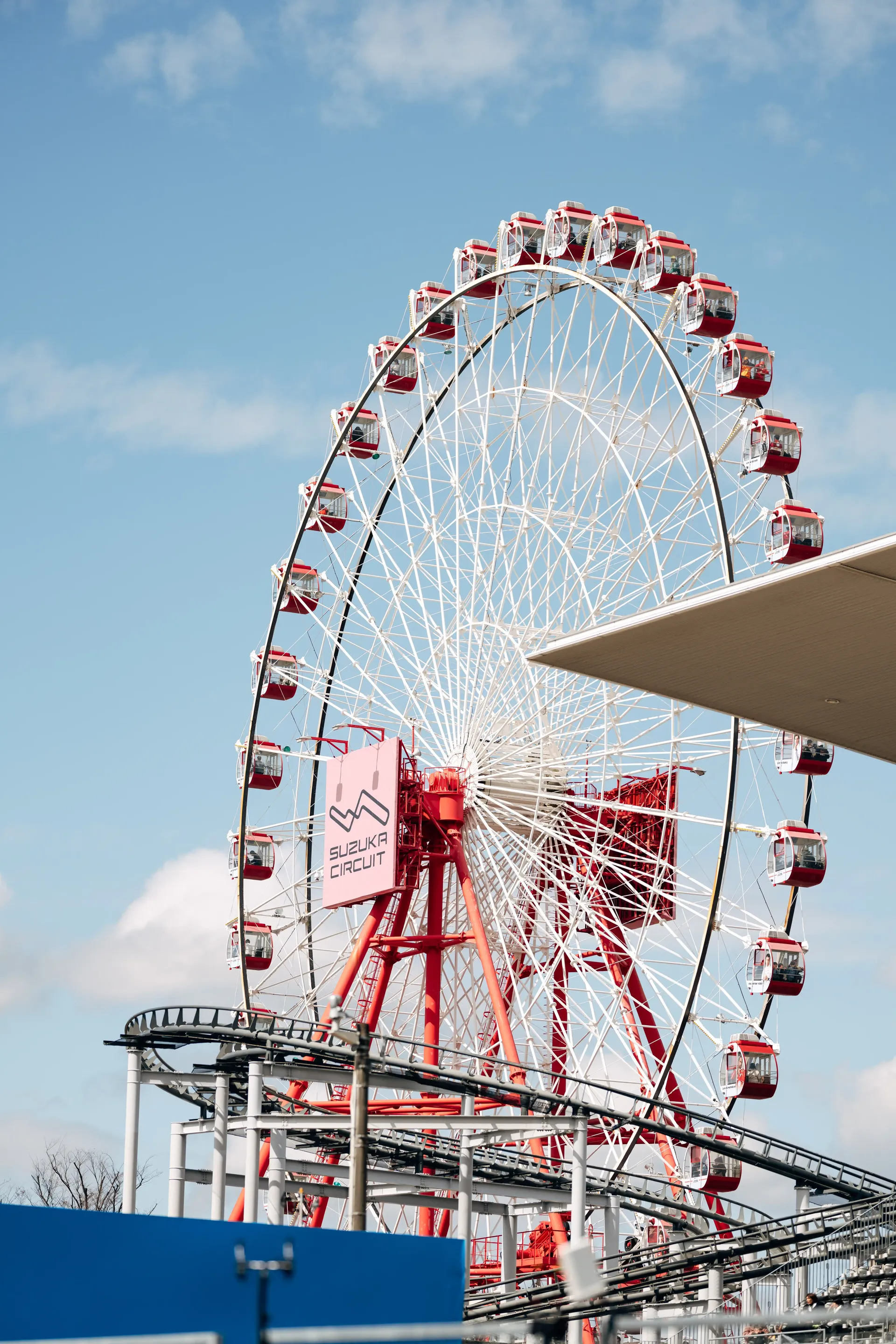 Ferris wheel at Suzuka Circuit during the Japanese Grand Prix media day, capturing the iconic skyline and vibrant atmosphere as the Audi Revolut F1® Team prepares for race weekend in Japan.