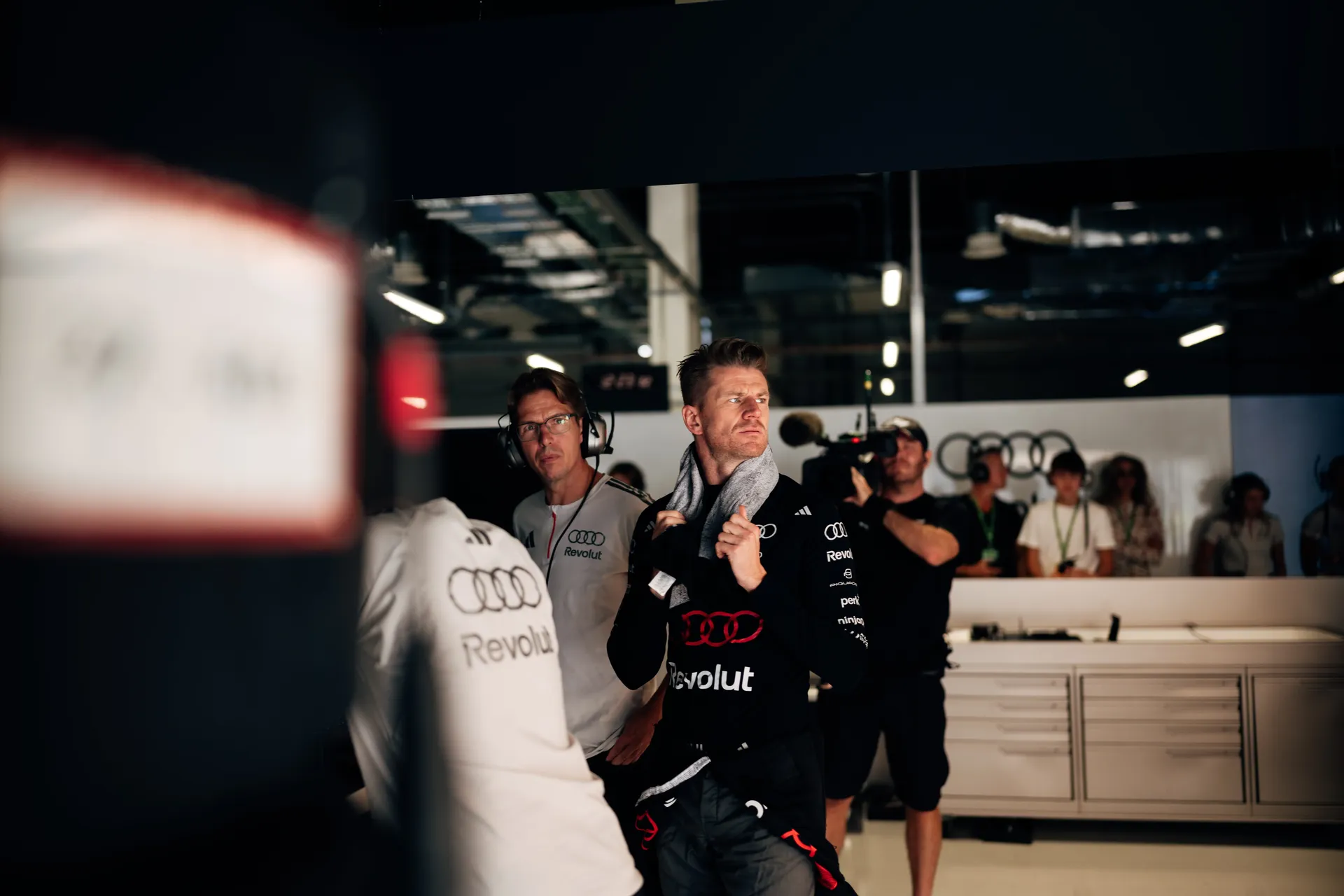 Nico Hulkenberg of the Audi Revolut F1® Team in the garage with his engineer in Madrid