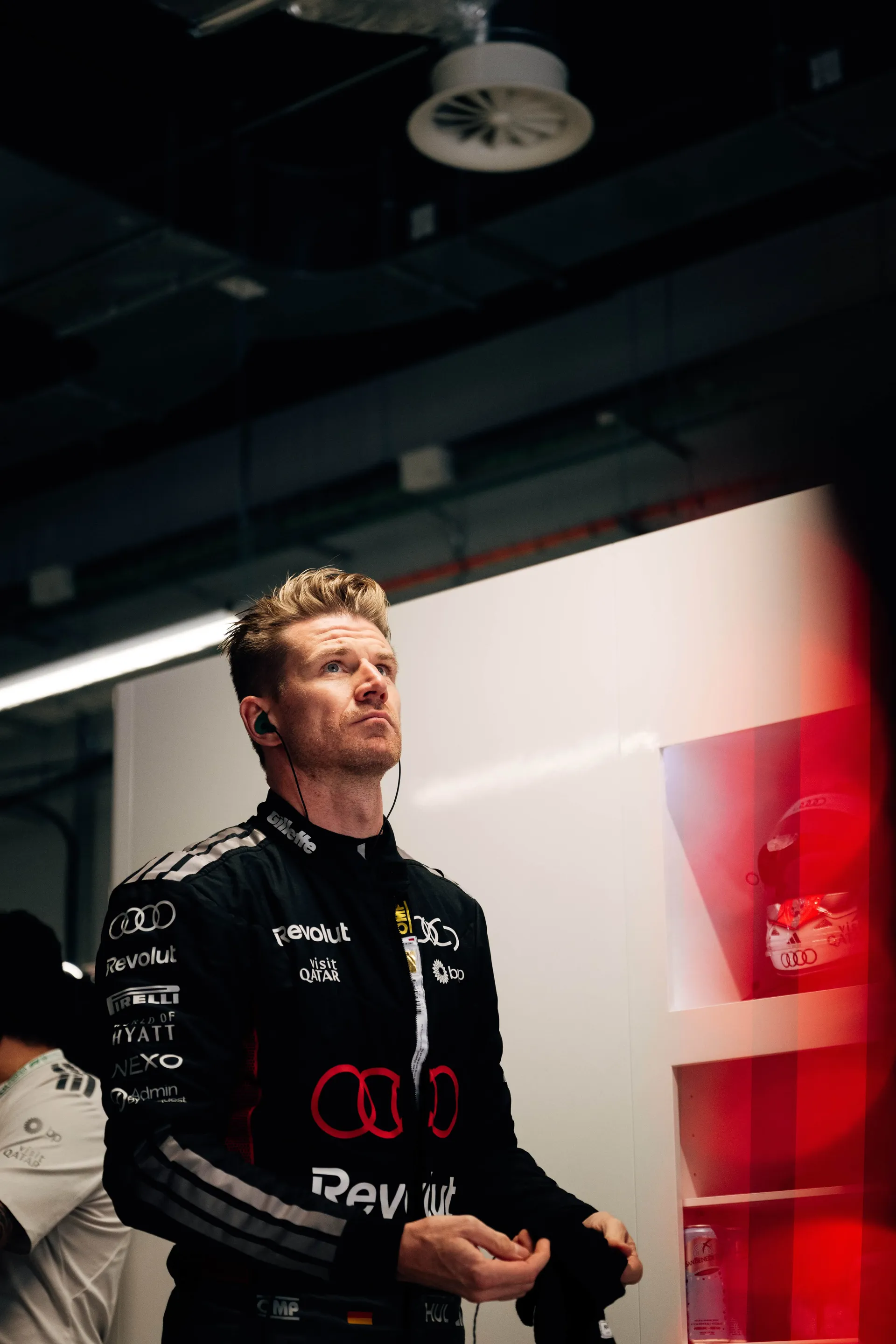 Nico Hulkenberg of the Audi Revolut F1® Team watching the timing screens in the garage in Madrid