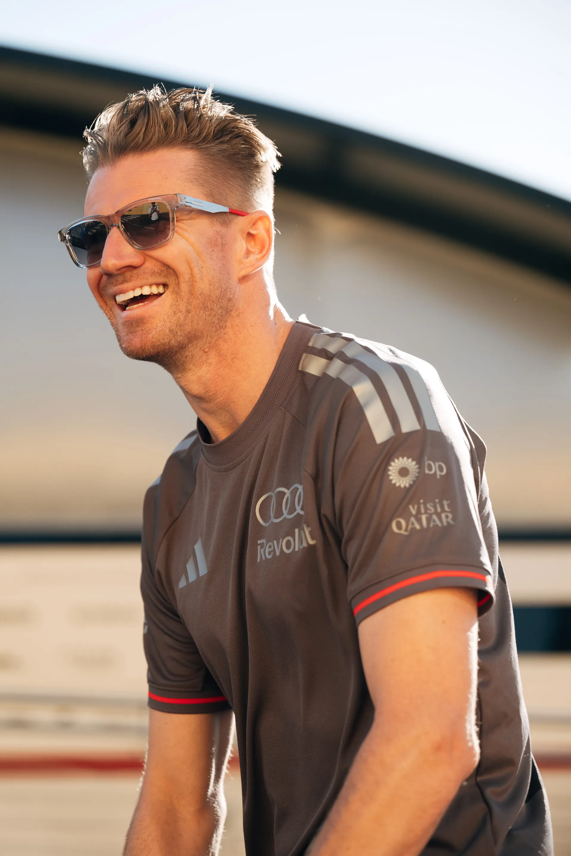 Nico Hulkenberg of the Audi Revolut F1® Team in team shirt and sunglasses in Madrid
