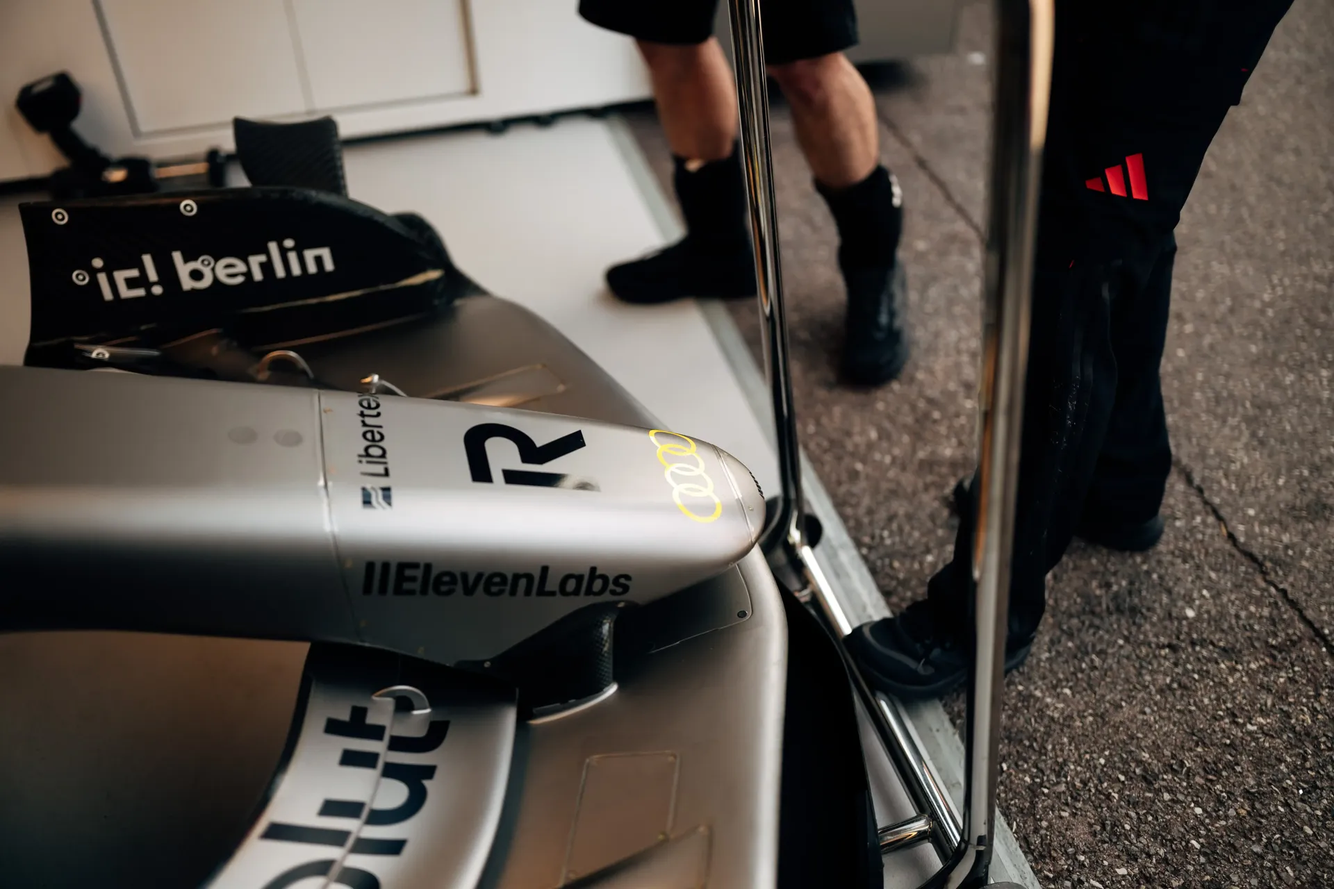 Close-up of the Audi Revolut F1® Team F1® car R26 bodywork and front section during garage preparations.