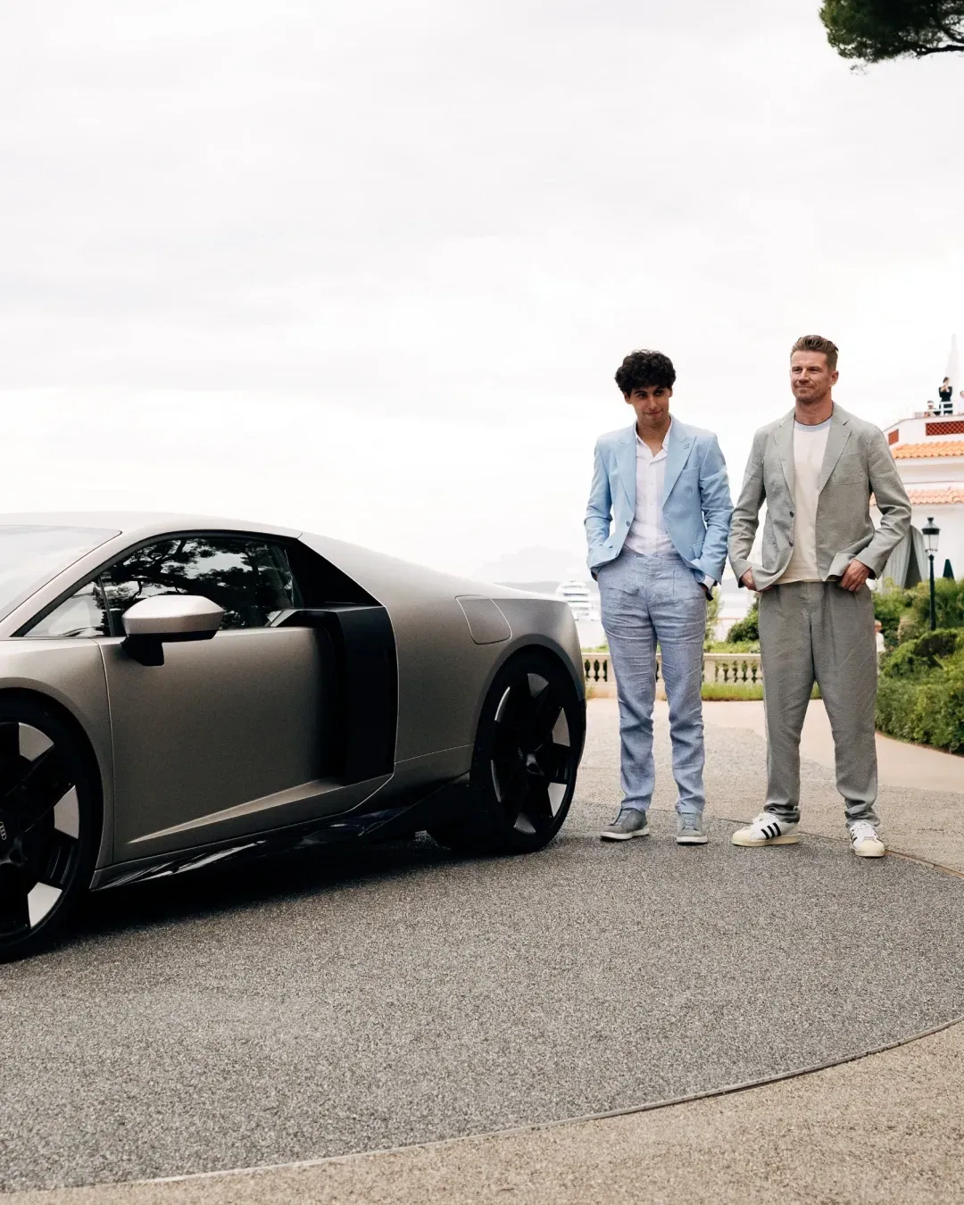 Nico Hulkenberg and Gabriel Bortoleto drivers at the Audi Revolut F1® Team posing next to the Audi Novulari at the car Launchevent at the Monaco Grand Prix weekend 2026