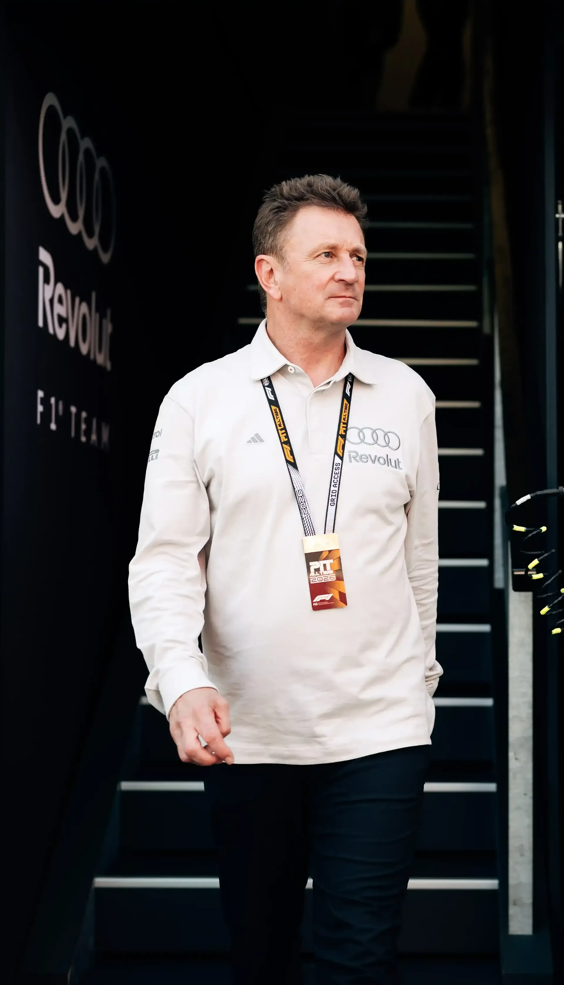 Audi Revolut F1® Team driving director Allan McNish walks out of the team garage during Monaco Grand Prix qualifying.