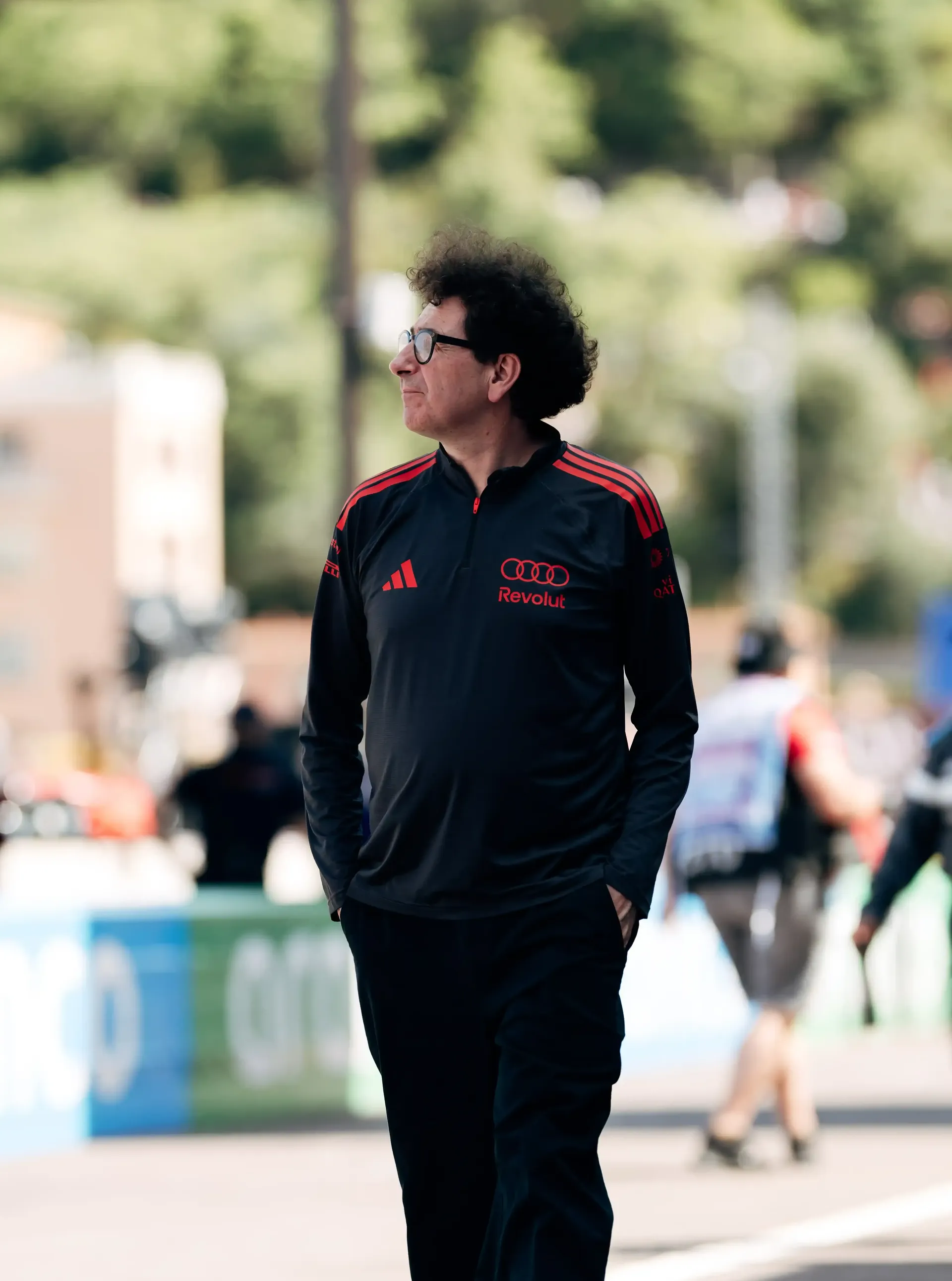 Audi Revolut F1® Team principal Mattia Binotto walks along the pit lane during Monaco Grand Prix qualifying.