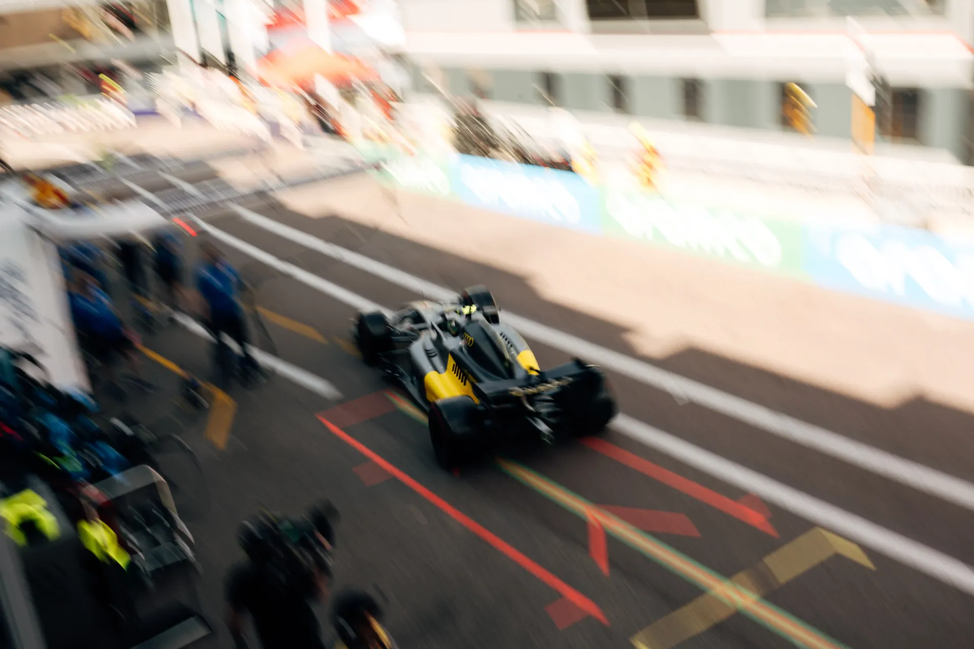 Audi Revolut F1® Team race car leaves the pit lane and joins the track during Monaco Grand Prix qualifying.