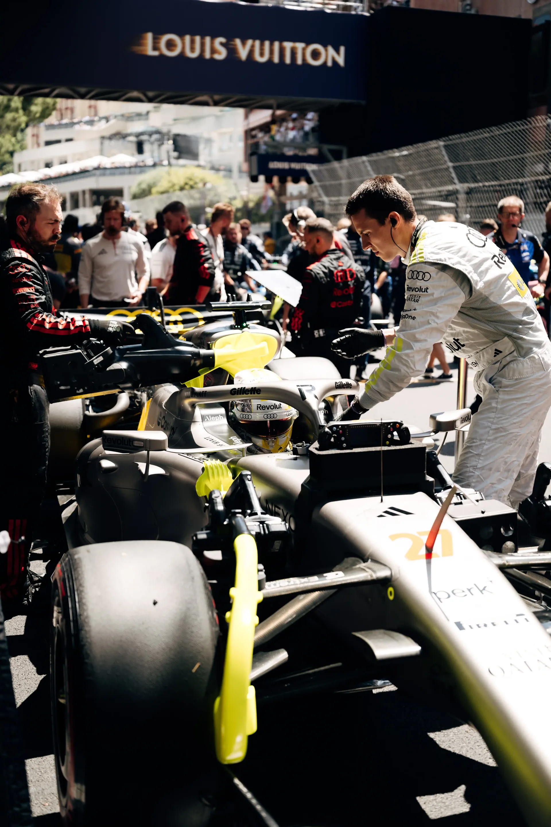 Audi Revolut F1® Team mechanics make final preparations to car R26 on the Monaco Grand Prix grid.