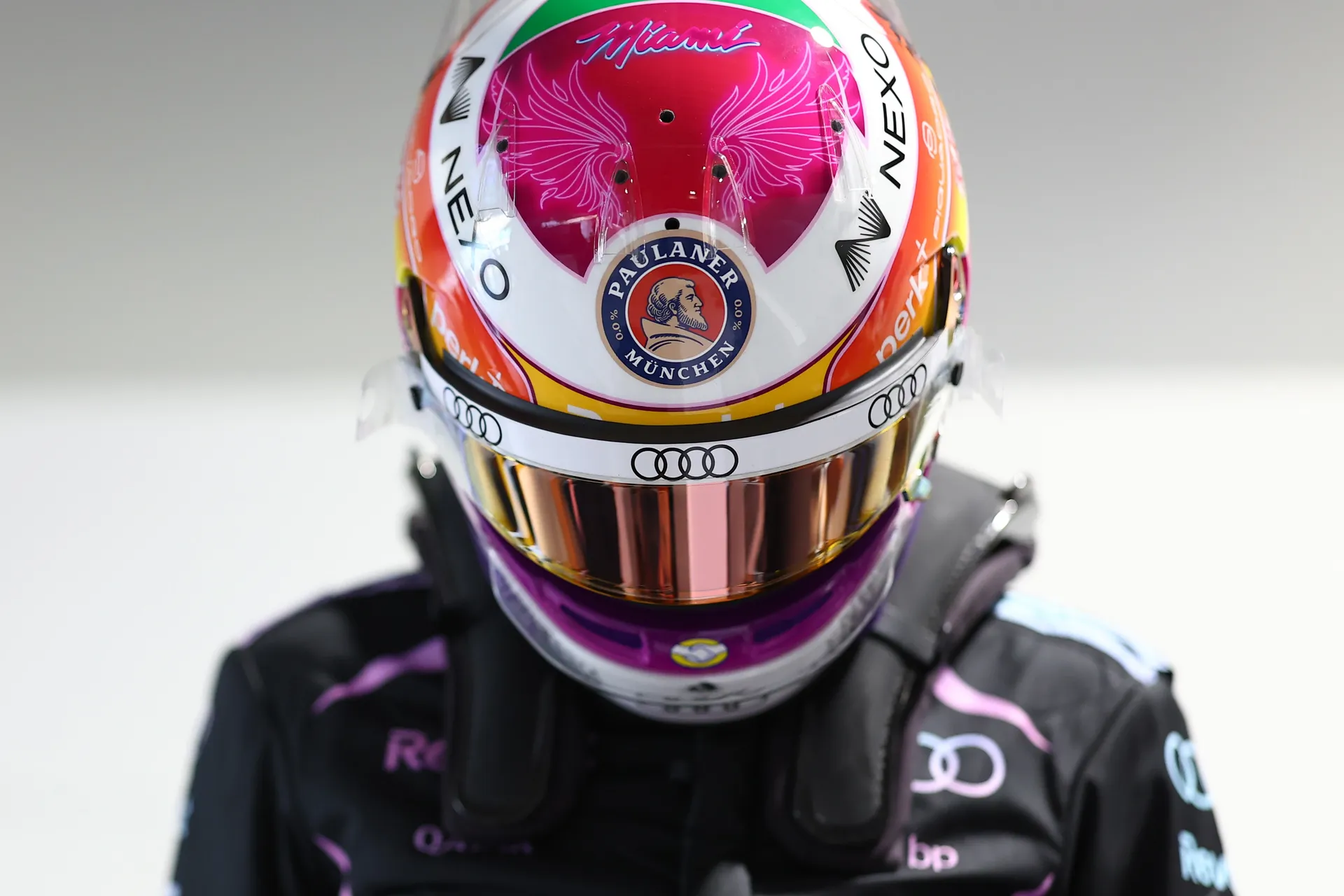 Close up of Gabriel Bortoleto helmet with Miami themed design and Audi branding