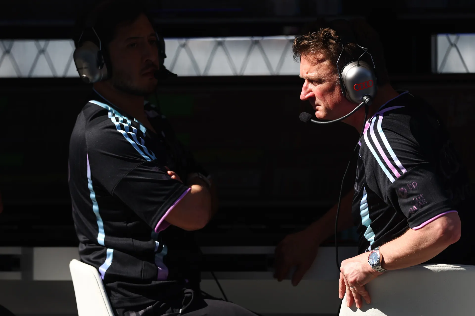 Audi Revolut F1® Team engineers on pit wall communicating via headsets during Miami Grand Prix session