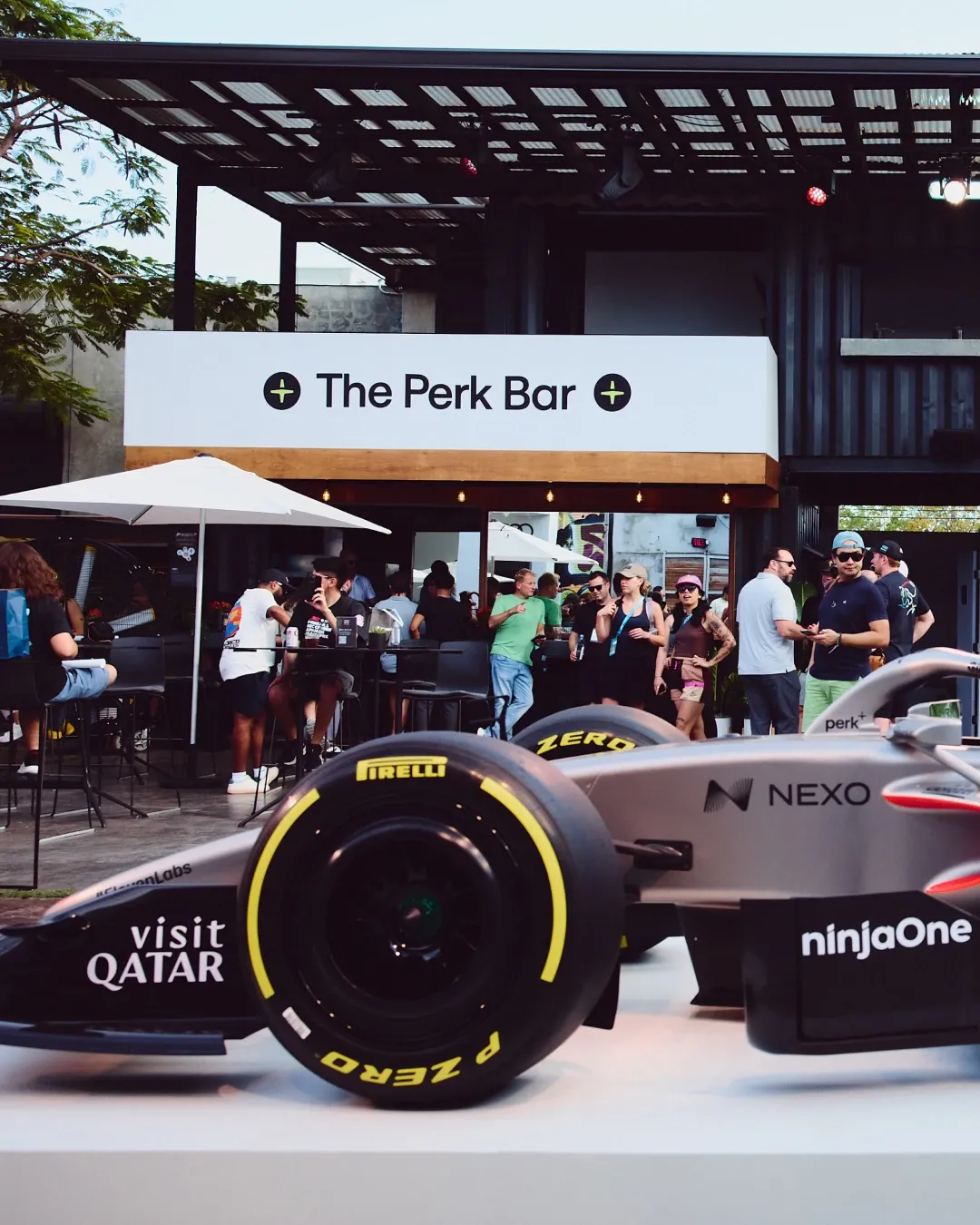 Audi Revolut F1® Team show car positioned in front of The Perk Bar during the MAPS Backlot activation in Miami.