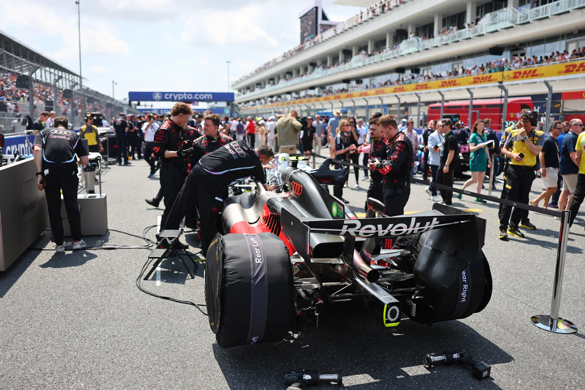 Audi Revolut F1® Team car in parc fermé area surrounded by team members and spectators at Miami Grand Prix