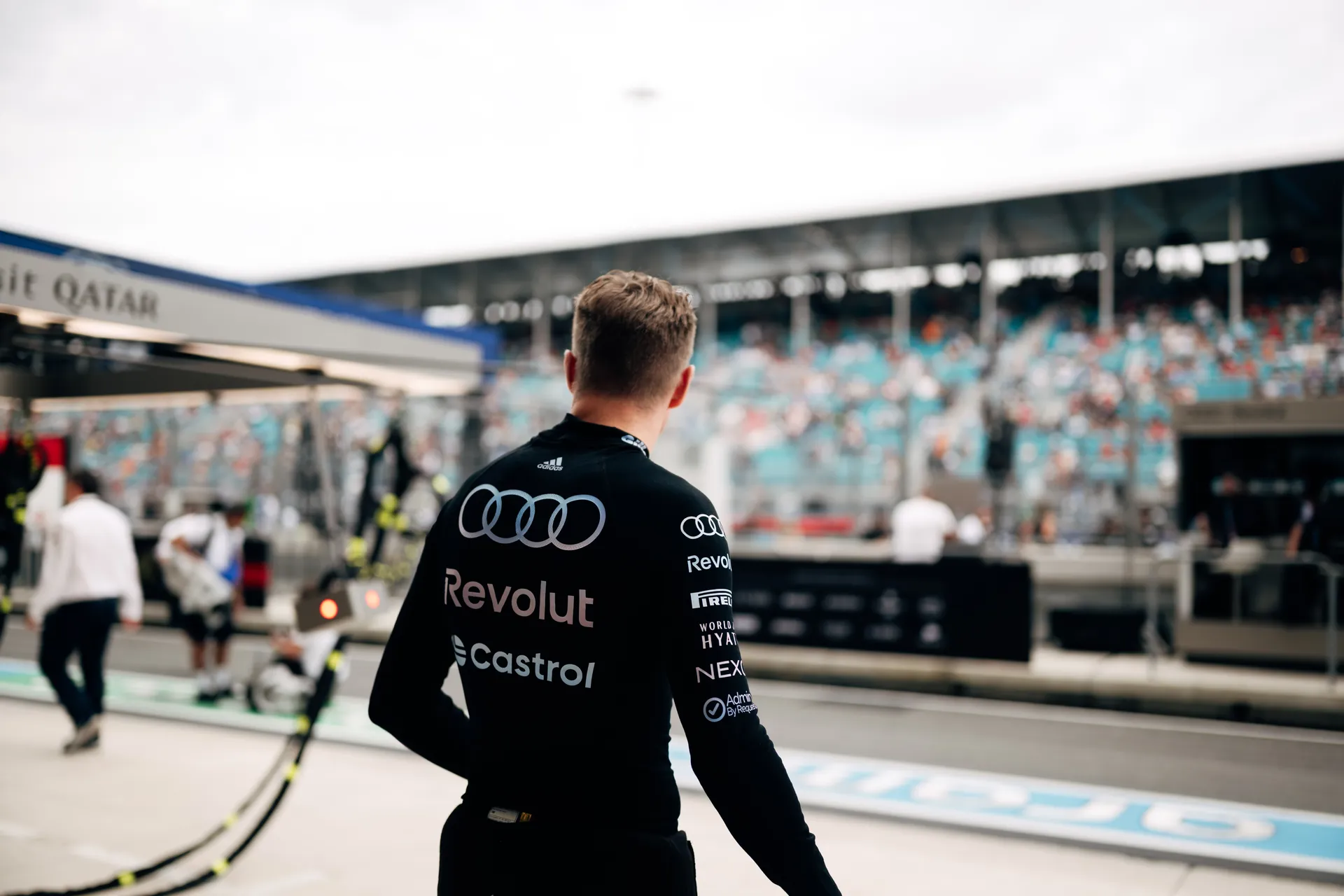 Nico Hulkenberg walking from Audi Revolut F1® Team Garage to track