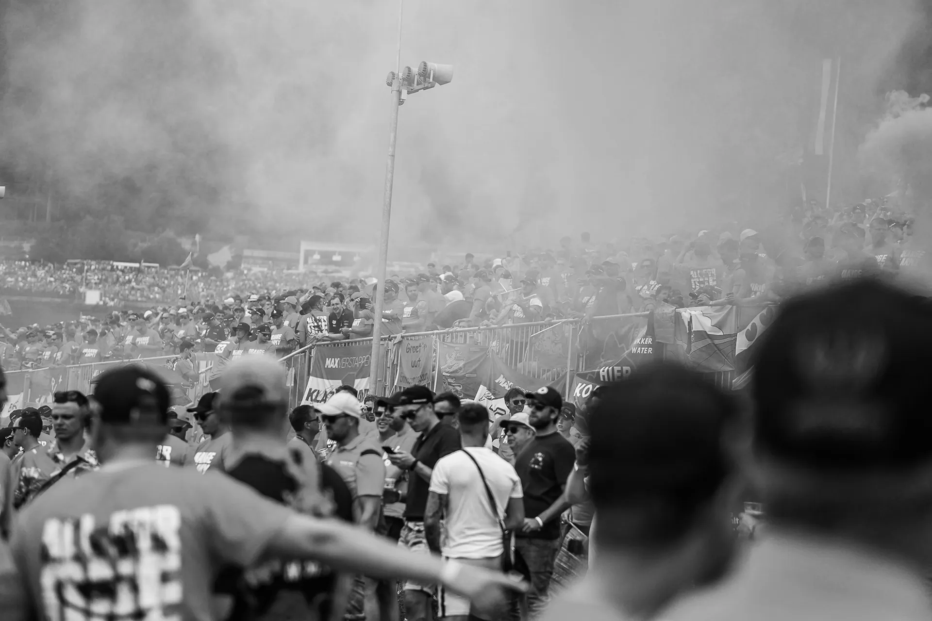 Orange Army fans and flares in the grandstand crowd — Audi Revolut F1 Team supporters at the Dutch GP