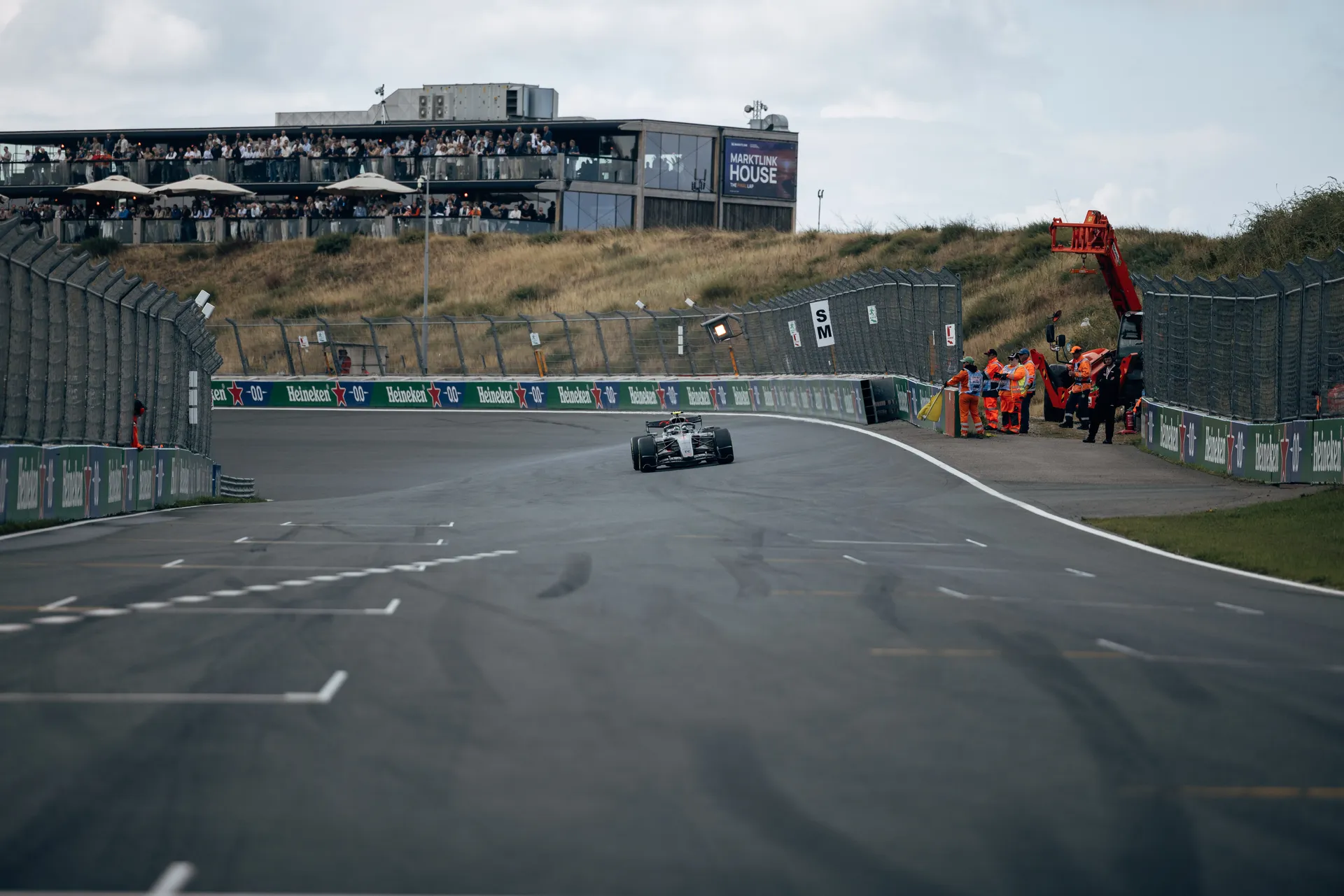 Audi Revolut F1® Team car on track at Zandvoort with the Marktlink House grandstand in the background