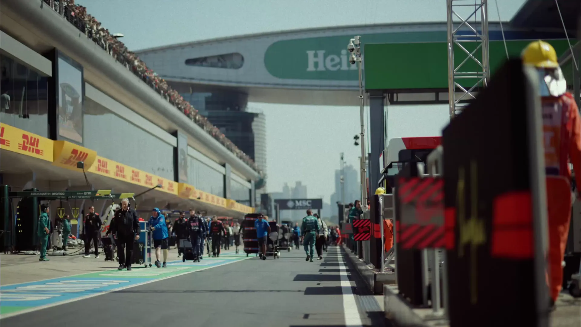 Crew members of the Audi Revolut F1® Team walking at the Chinese Grand Prix racetrack in Shanghai
