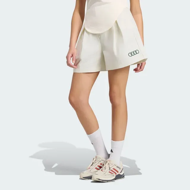 Off-white pleated shorts with green Audi rings, adidas x Audi Revolut F1® Team Sampa Soul collection