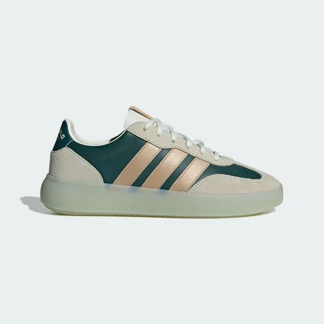 Off-white perforated trainer with green stripes, adidas x Audi Revolut F1® Team Sampa Soul collection