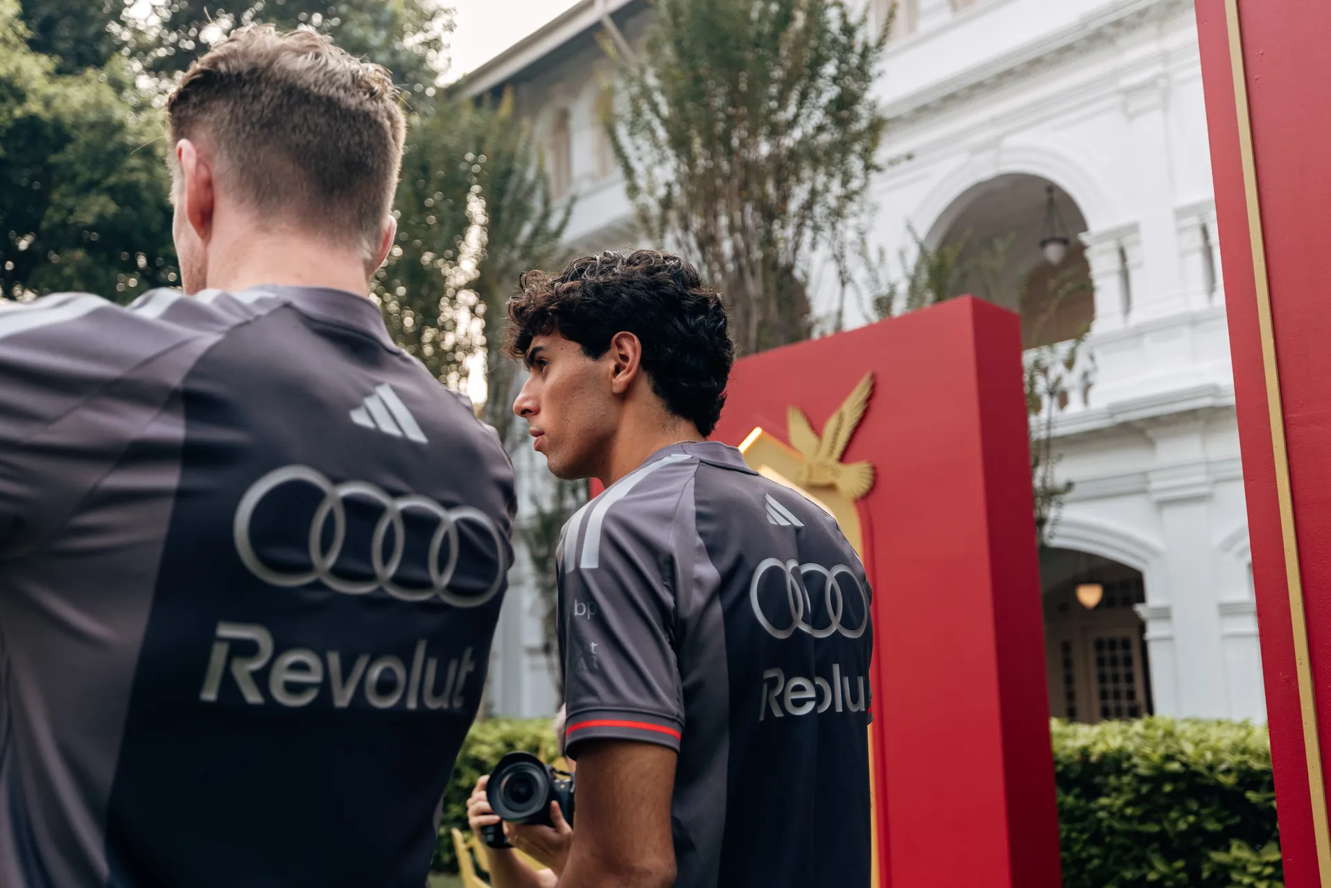Backshot of Audi Revolut F1® Team drivers Nico Hulkenberg and Gabriel Bortoleto at the Singapore GP 2026