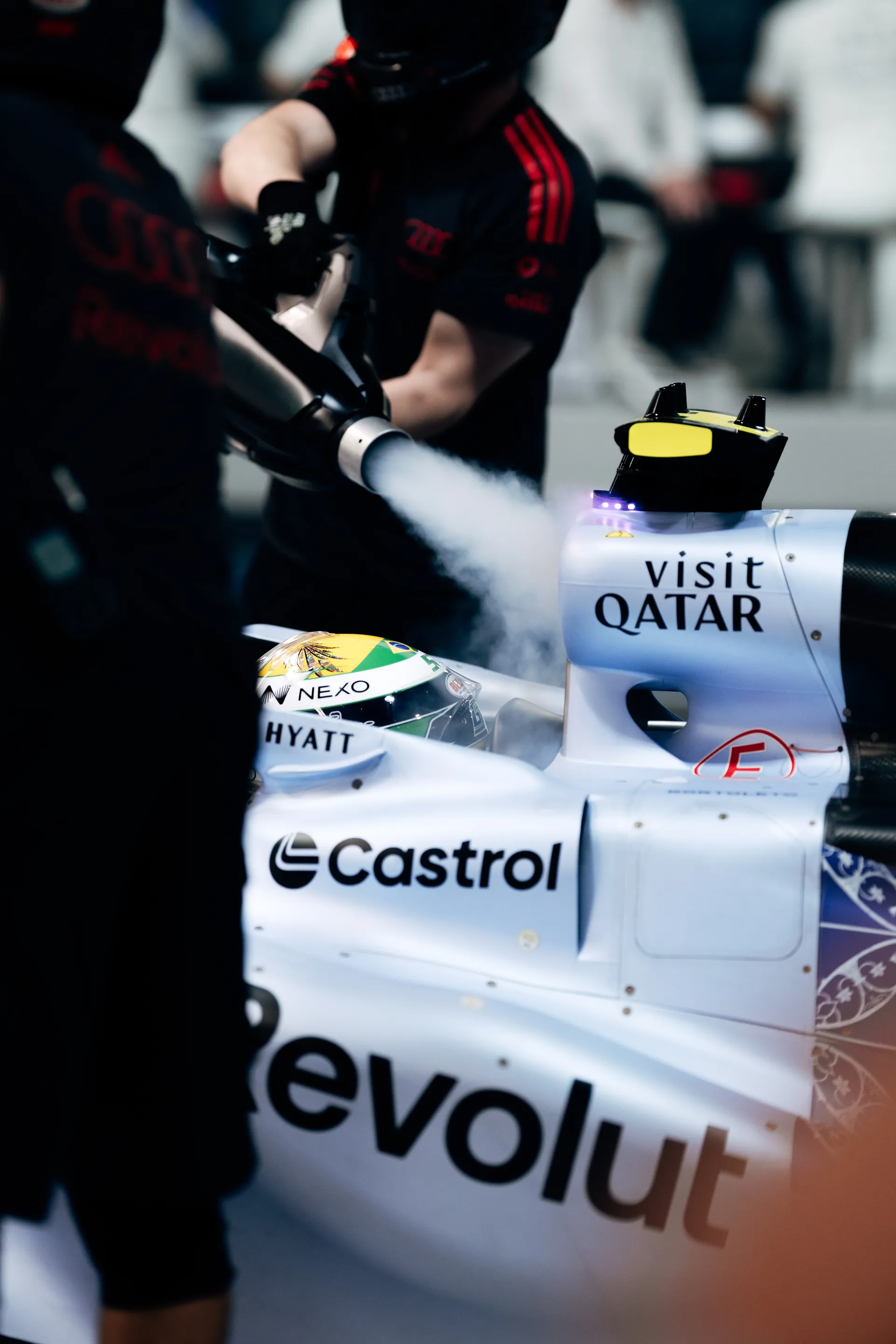 Nico Hulkenberg in the cockpit of the car R26, surrounded by Audi Revolut F1® Team mechanics.