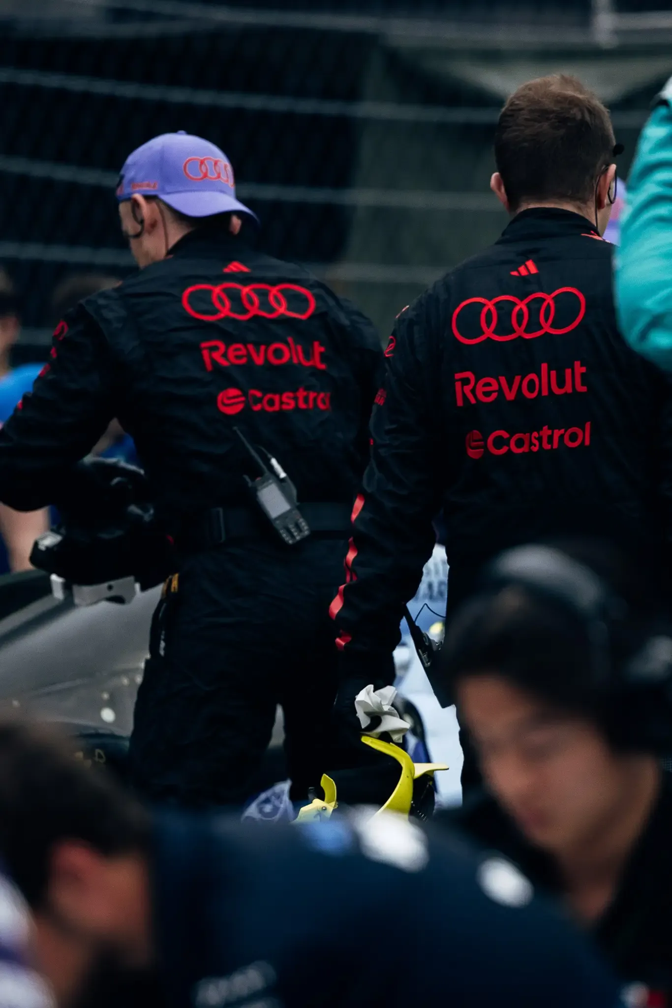 Audi Revolut F1® Team mechanics working on the car.