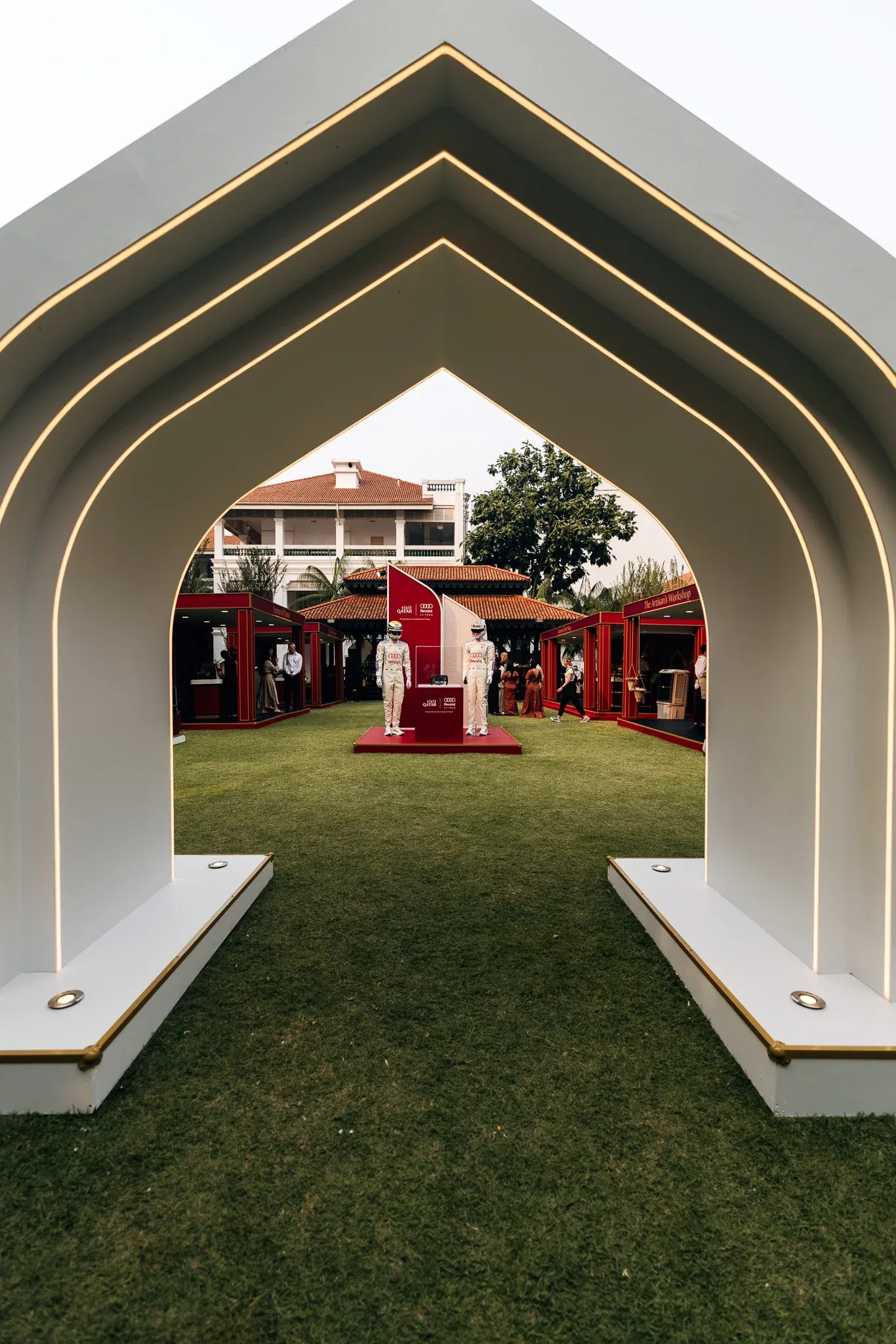 Decorative archway leading into an outdoor event area.