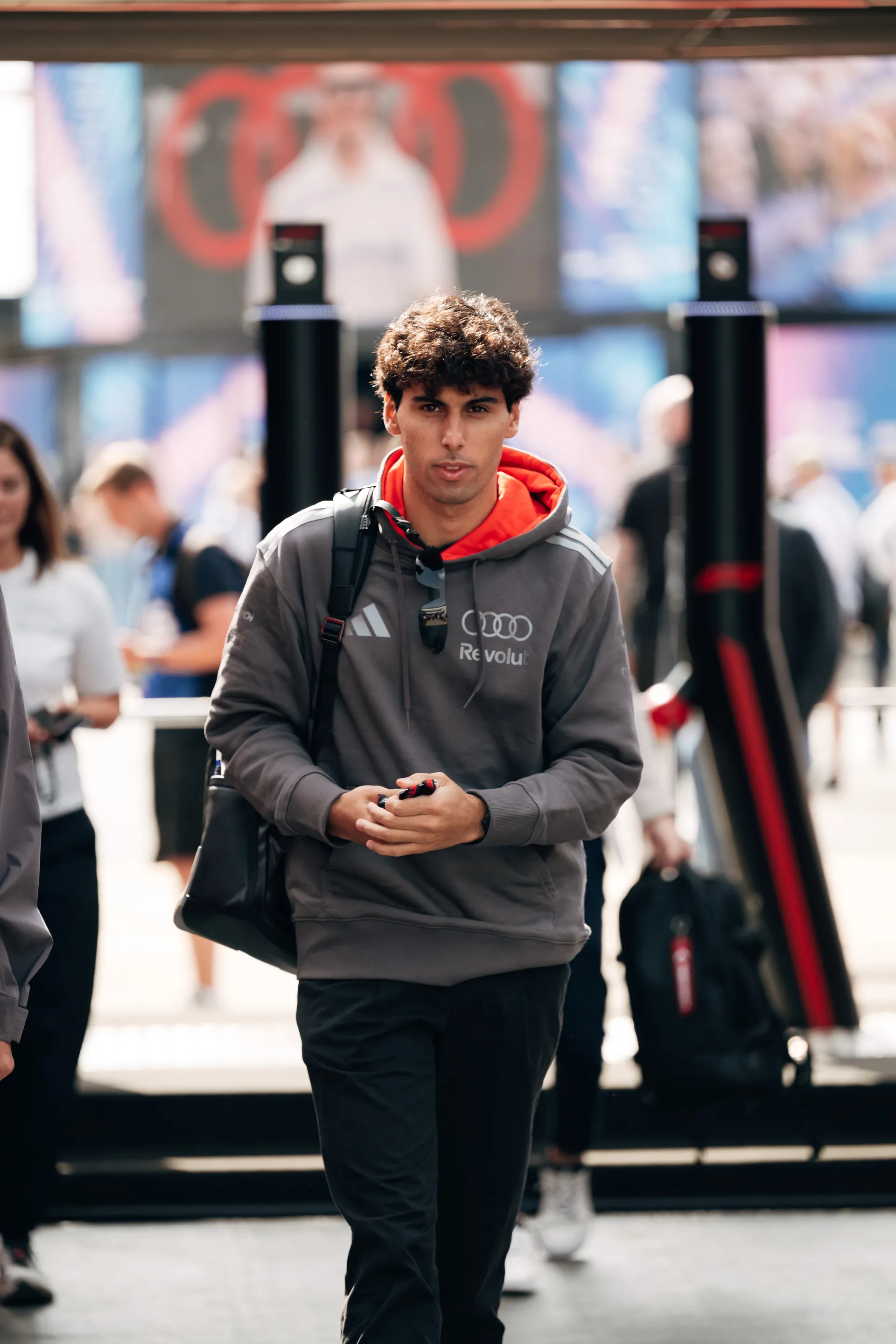 Gabriel Bortoleto arrives in the Silverstone paddock on Friday, moving through the venue with Audi Revolut F1® Team gear and equipment.