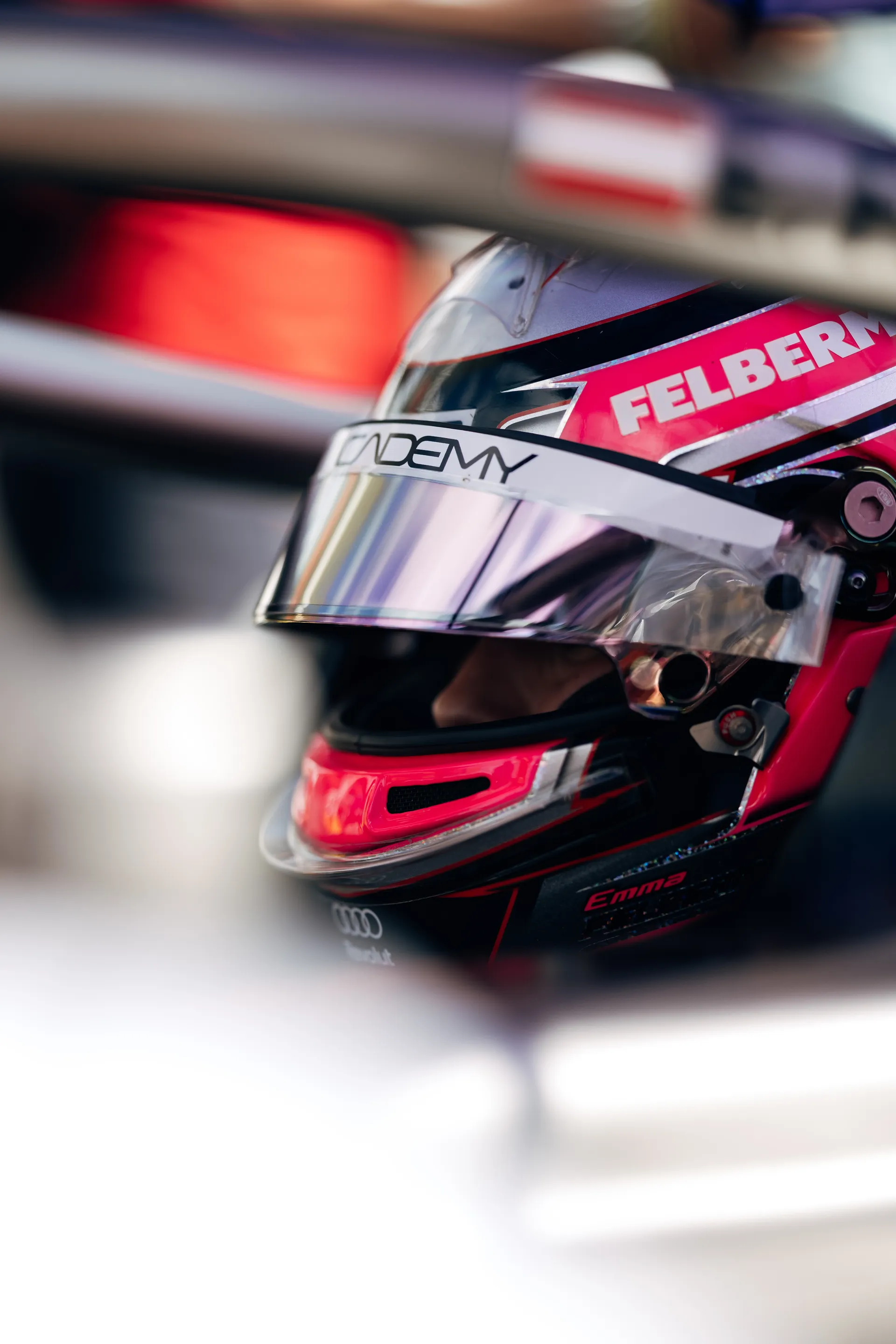 Close-up of Emma Felbermayr’s helmet inside an F1 Academy car on the Silverstone grid.