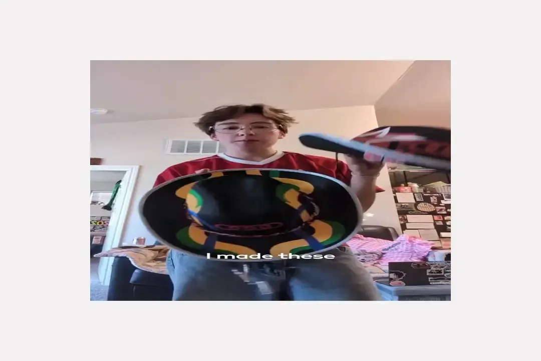 Audi Revolut F1® Team Gabi and Nico get gifted custom cowboy hats by a superfan in the garage