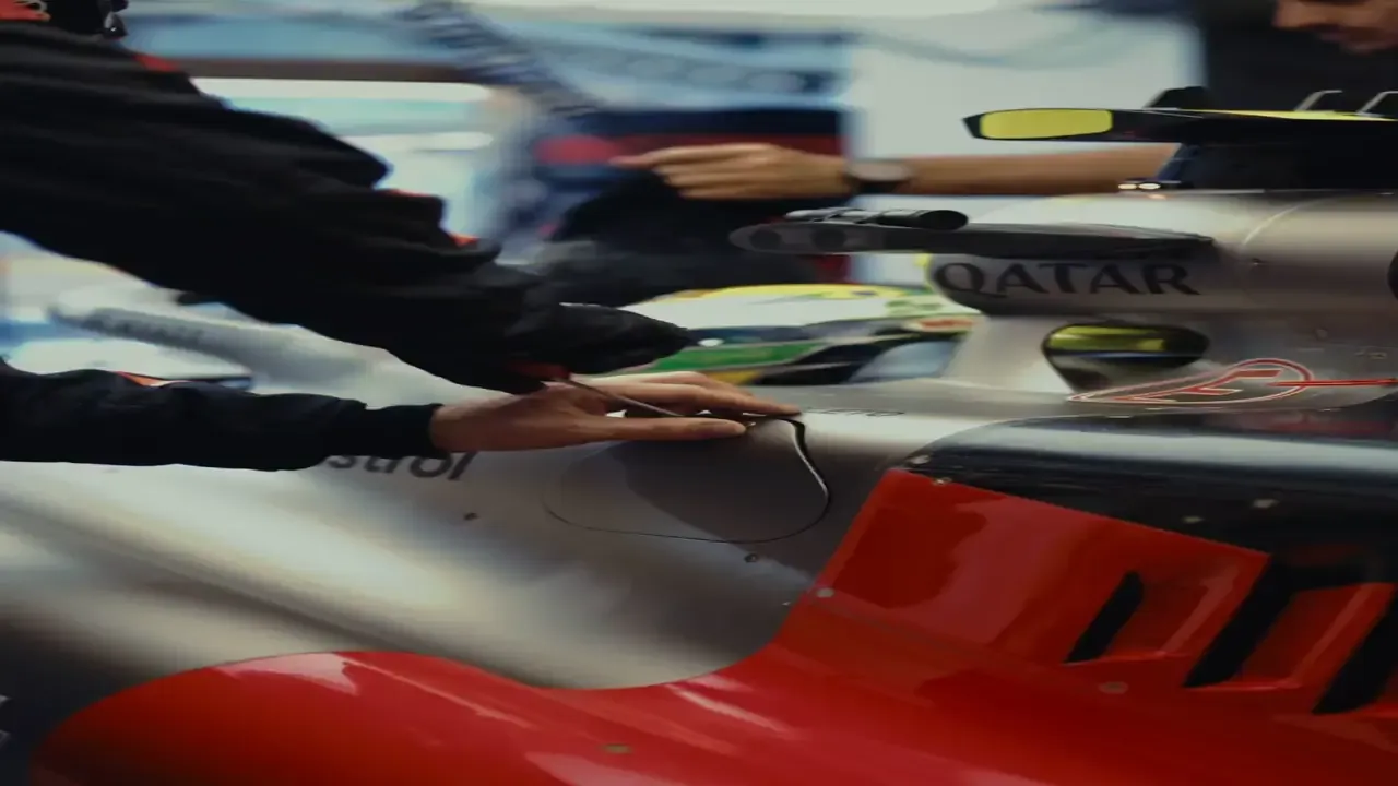 Audi Revolut F1® Team mechanics preparing the car before practice.