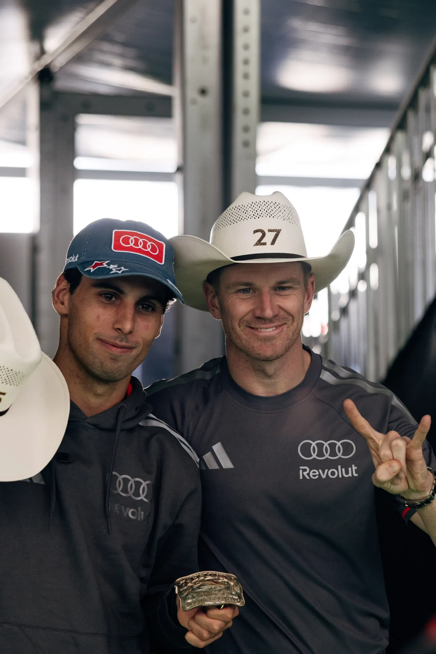 Audi Revolut F1® Team drivers Nico Hulkenberg and Gabriel Bortoleto posing in cowboy hats at the USA Grand Prix