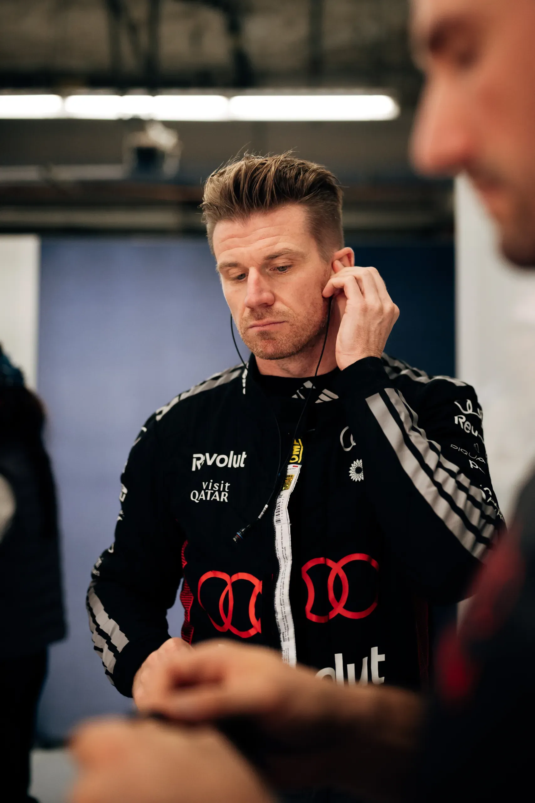 Audi Revolut F1® Team driver Nico Hulkenberg fitting his earpiece in the garage at the United States Grand Prix