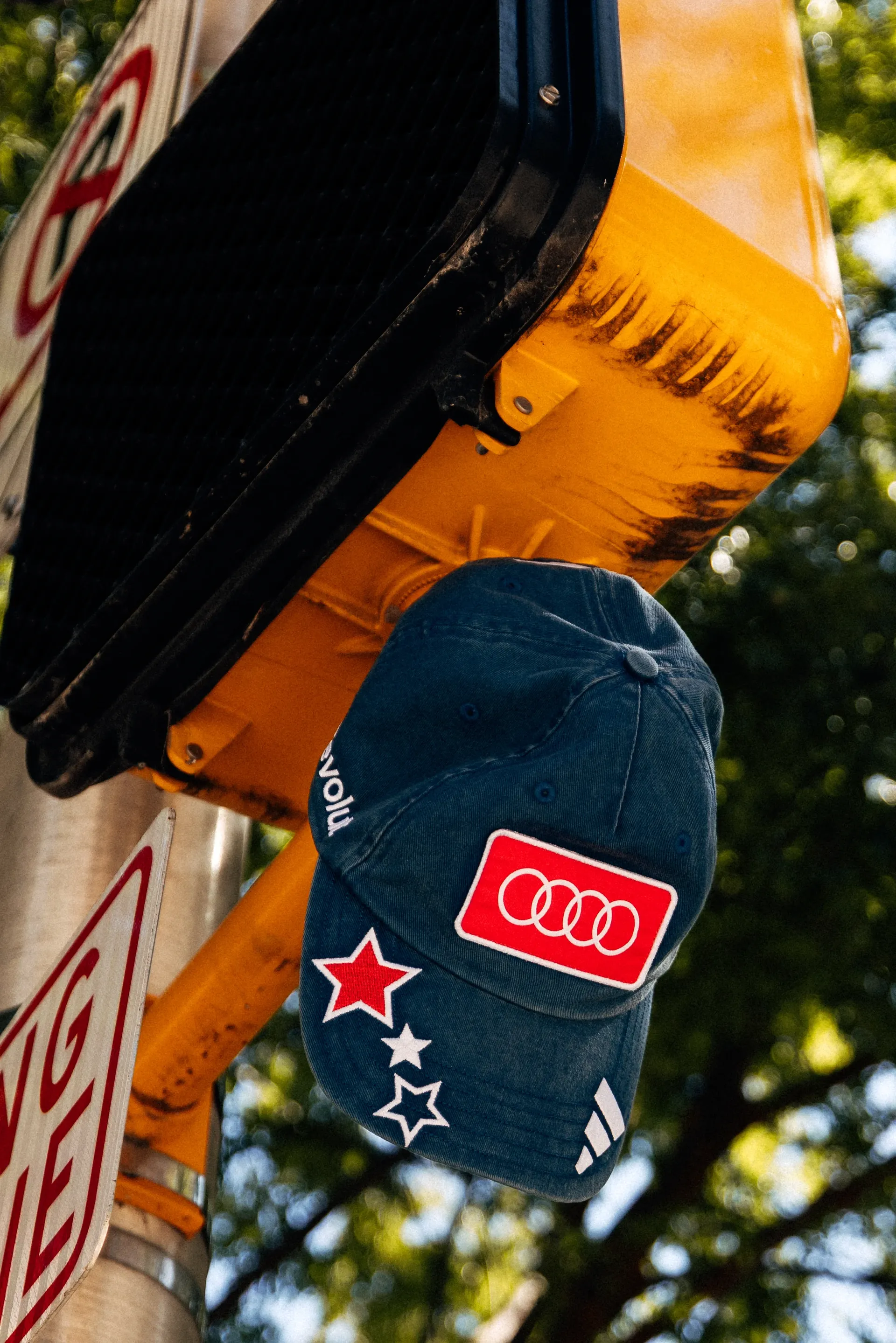 adidas x Audi Revolut F1® Team cap hanging from a pedestrian signal at the United States Grand Prix in Austin