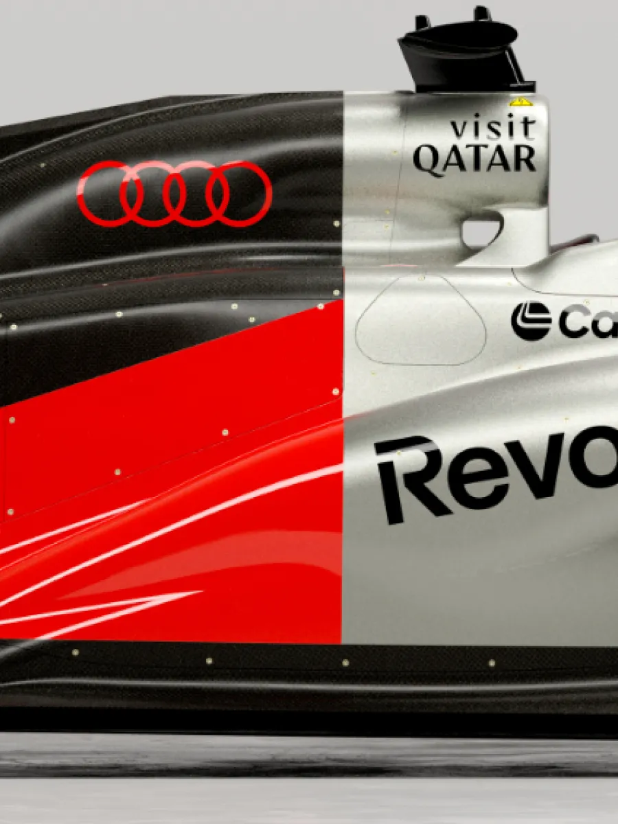 Audi Revolut F1® Team car R26 next to the Audi RS 5 in the studio